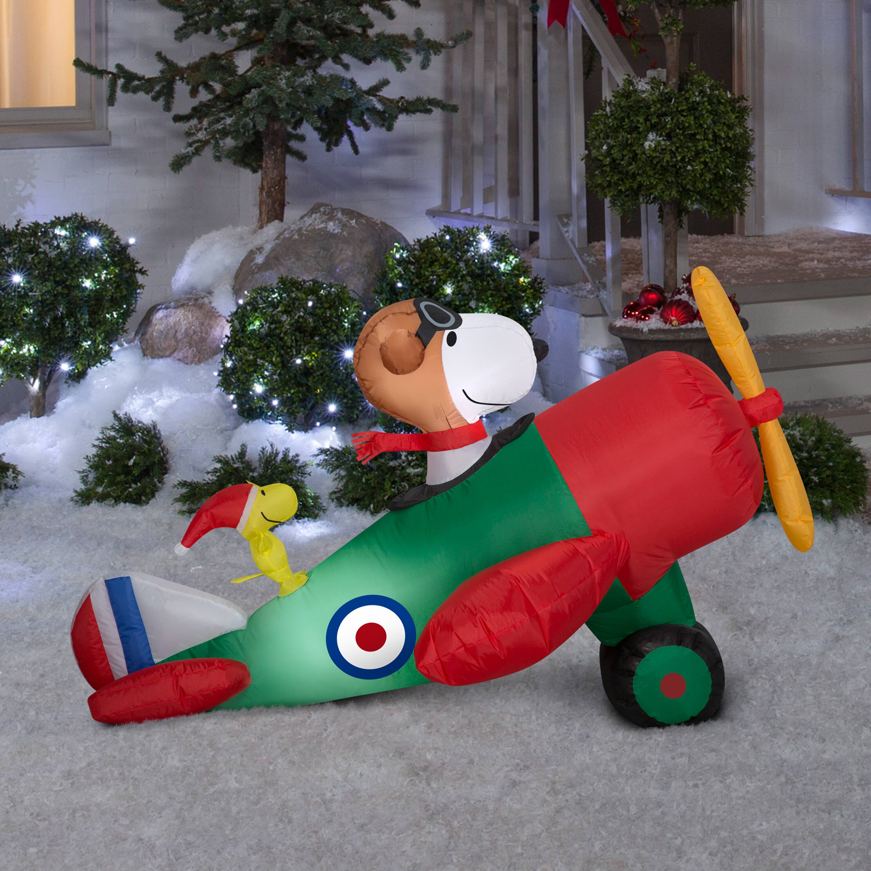 2.5ft. Airblown® Inflatable Peanuts® Snoopy in Airplane Christmas Light Décor