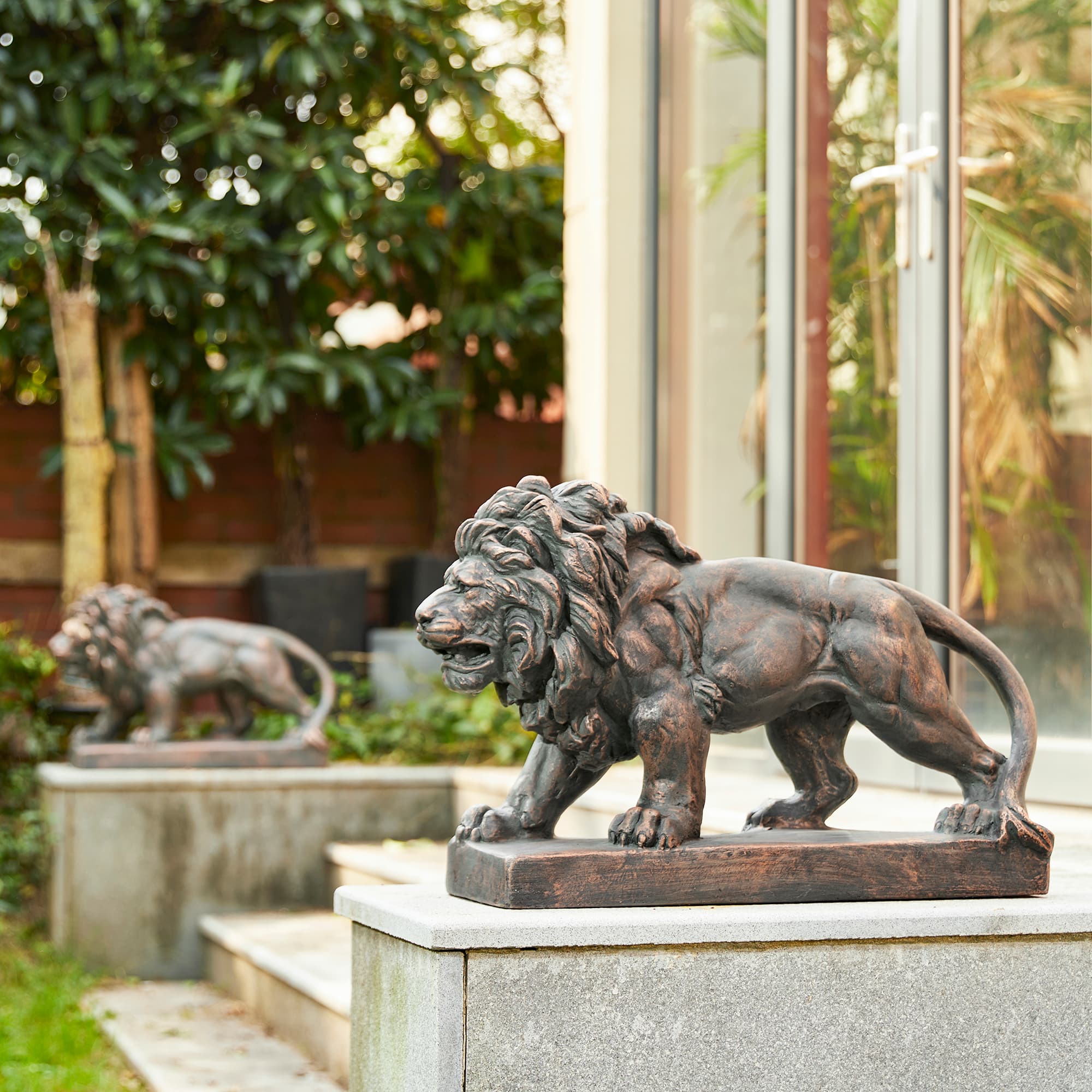 Glitzhome® 24.5" Walking Lion Garden Statue