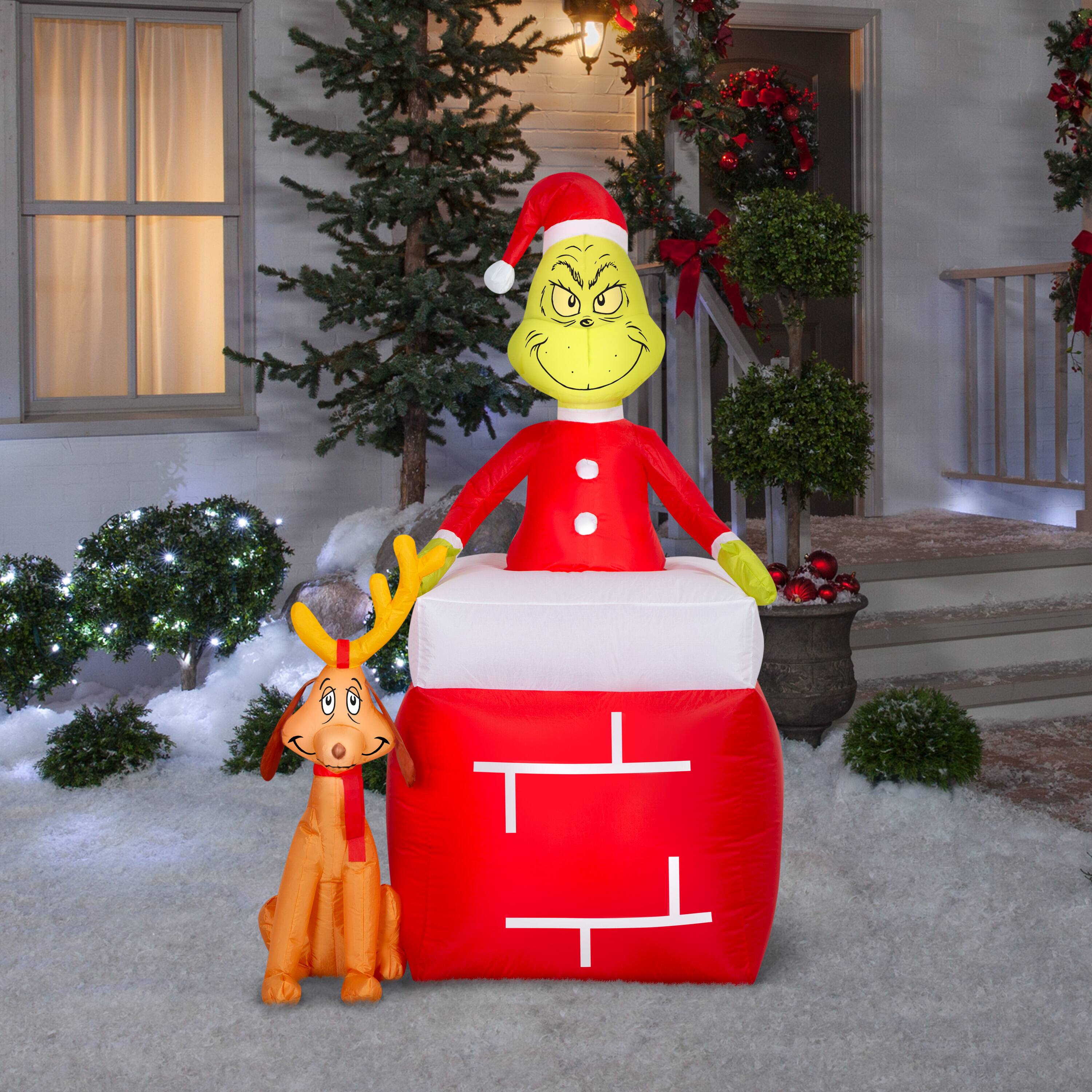 5.5ft. Airblown® Inflatable Dr. Seuss™ The Grinch™ Out of Chimney with Max Christmas Light Scene