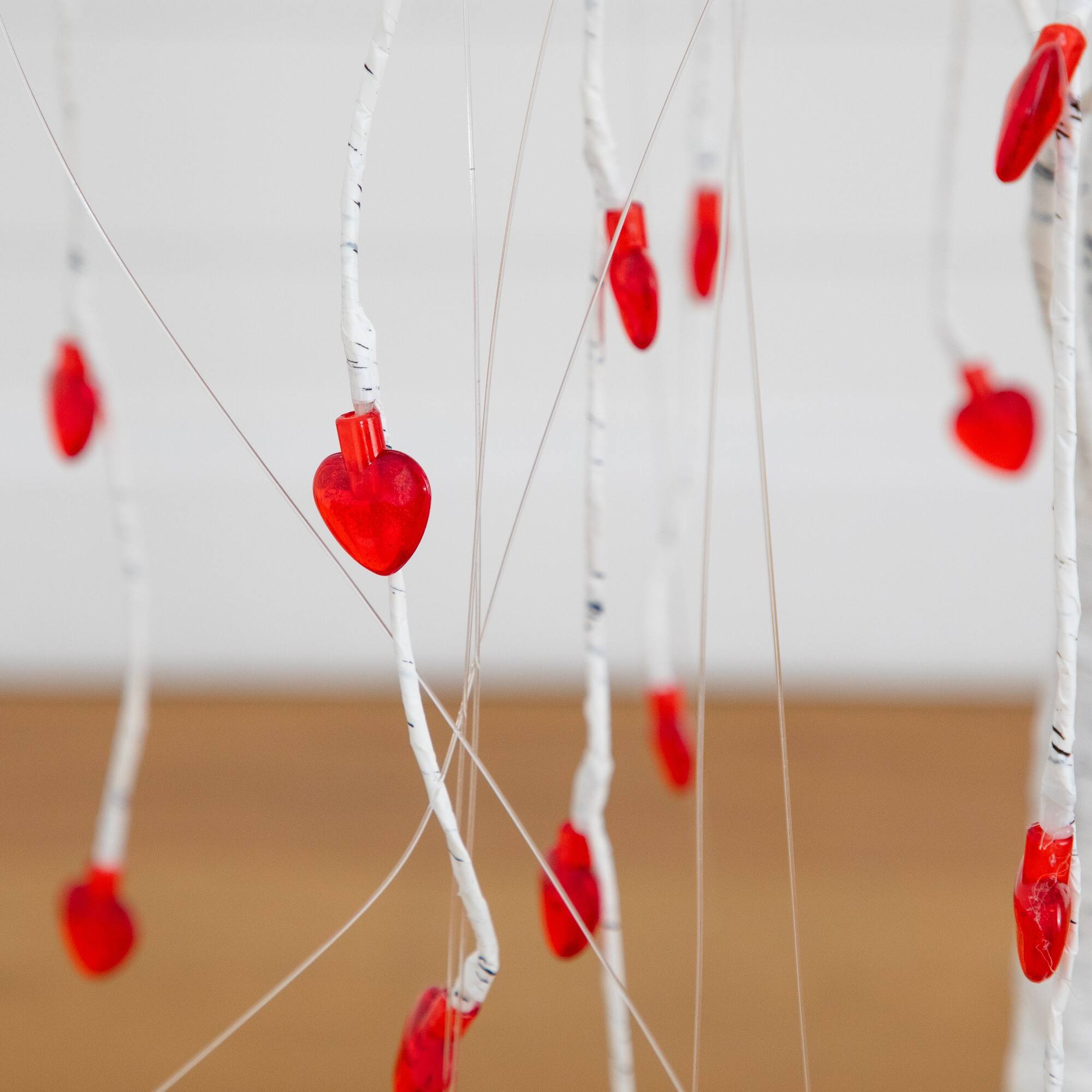 4ft. Pre-Lit Artificial Valentine's Day Willow Tree with 48 Heart Shaped LED Lights