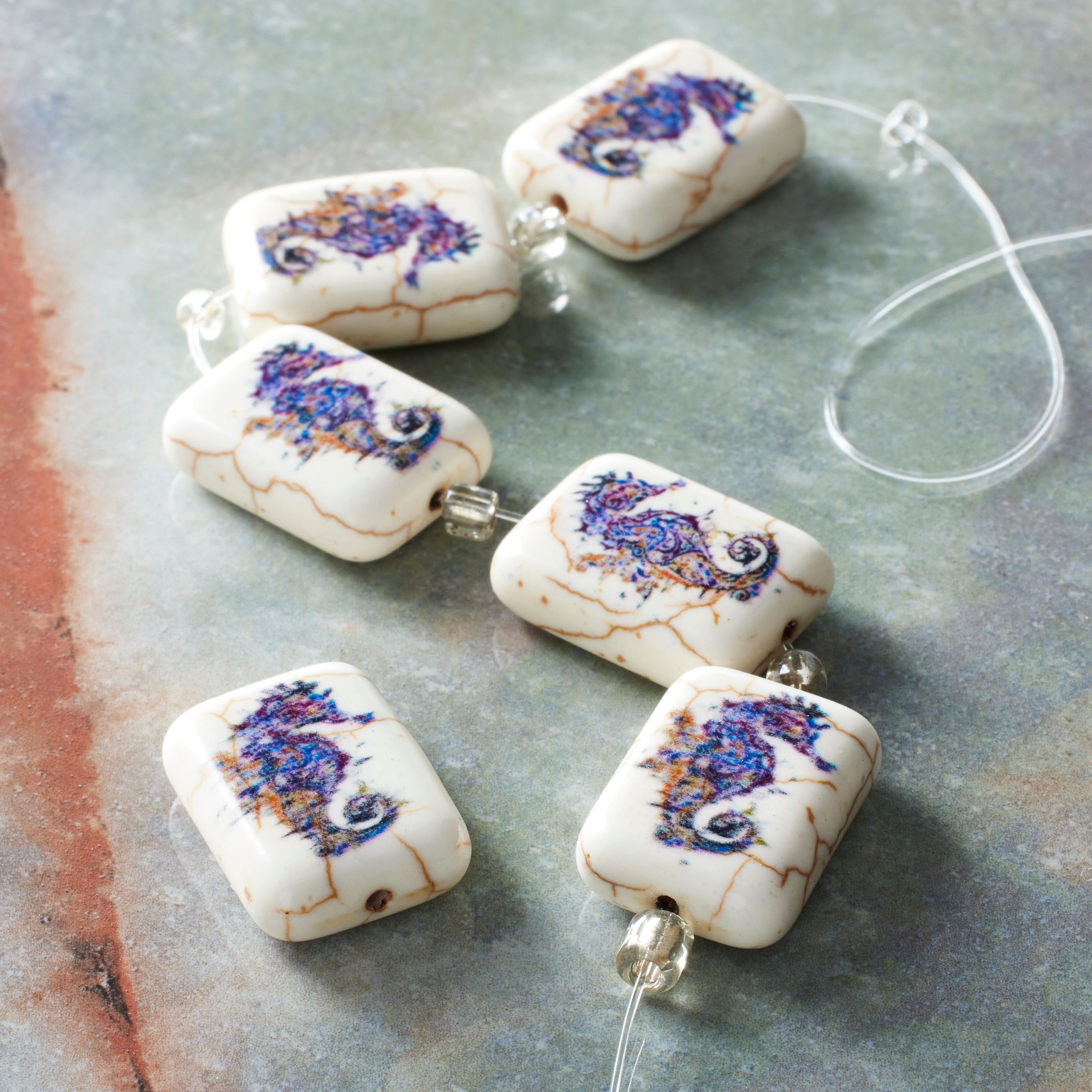 12 Packs: 6 ct. (72 total)  Seahorse Print Stone Beads, 20mm by Bead Landing™