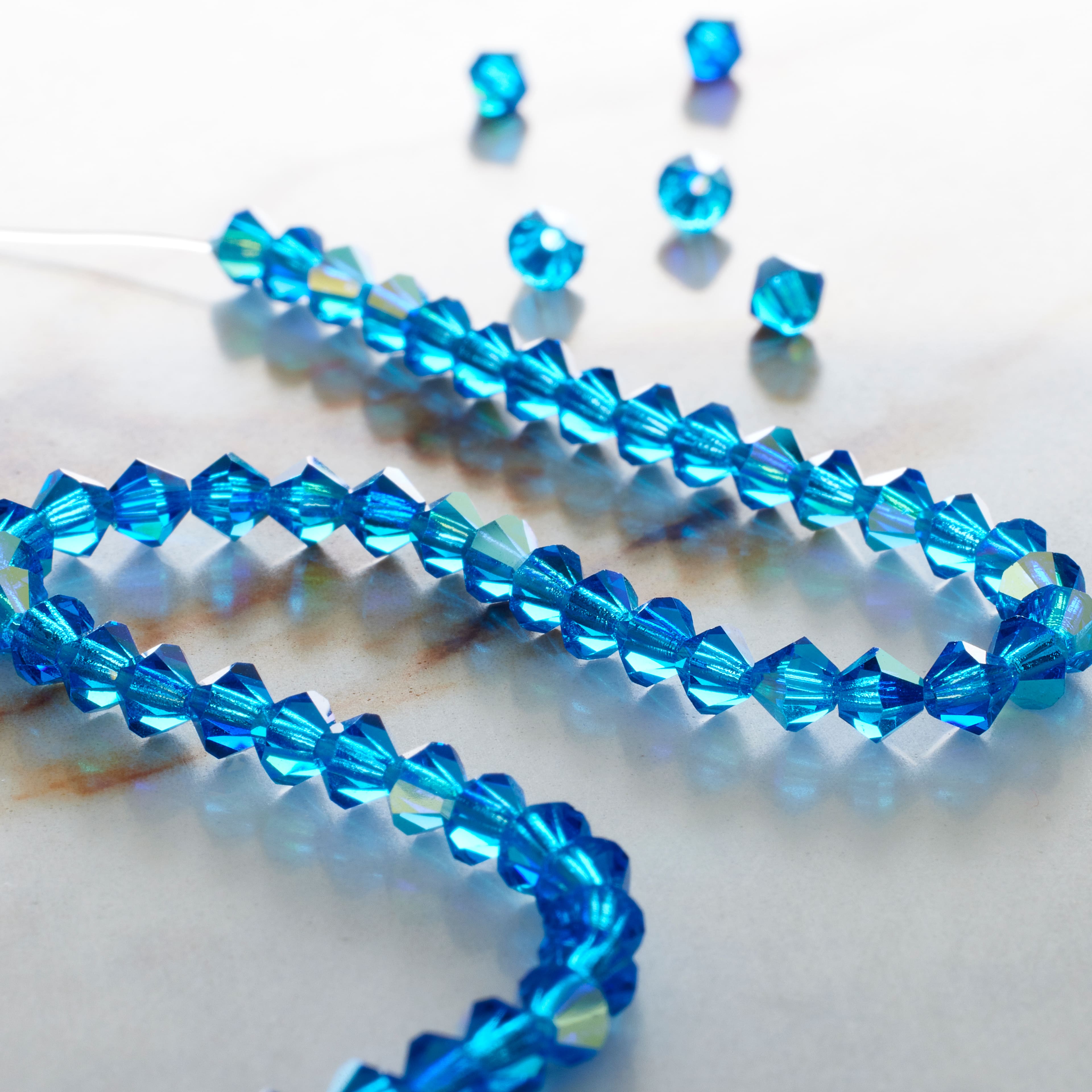 12 Pack: Preciosa® Czech Crystal Bicone Beads, 4mm by Bead Landing™