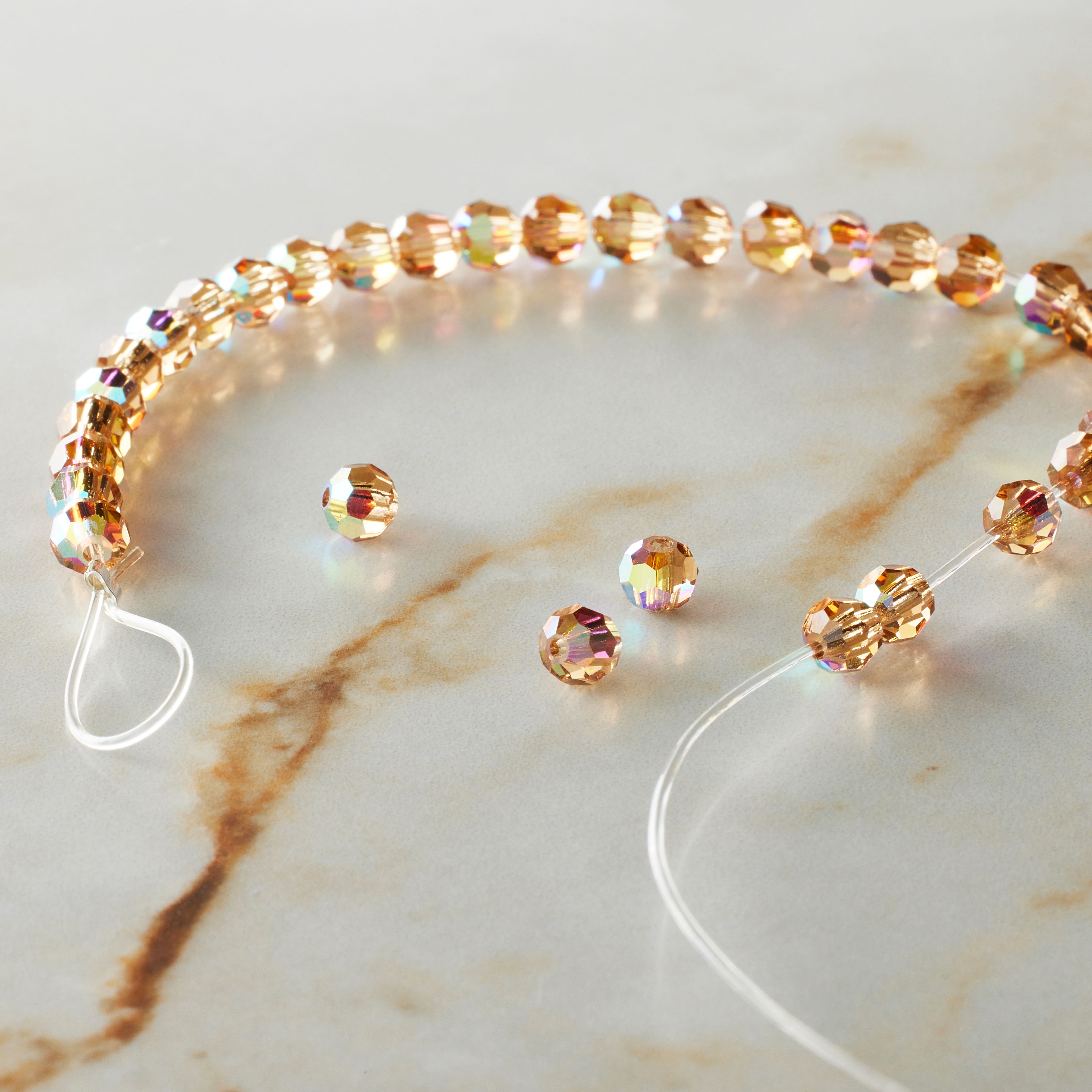 12 Packs: 31 ct. (372 total) Preciosa Glass Crystal Round Beads, 4mm by Bead Landing™