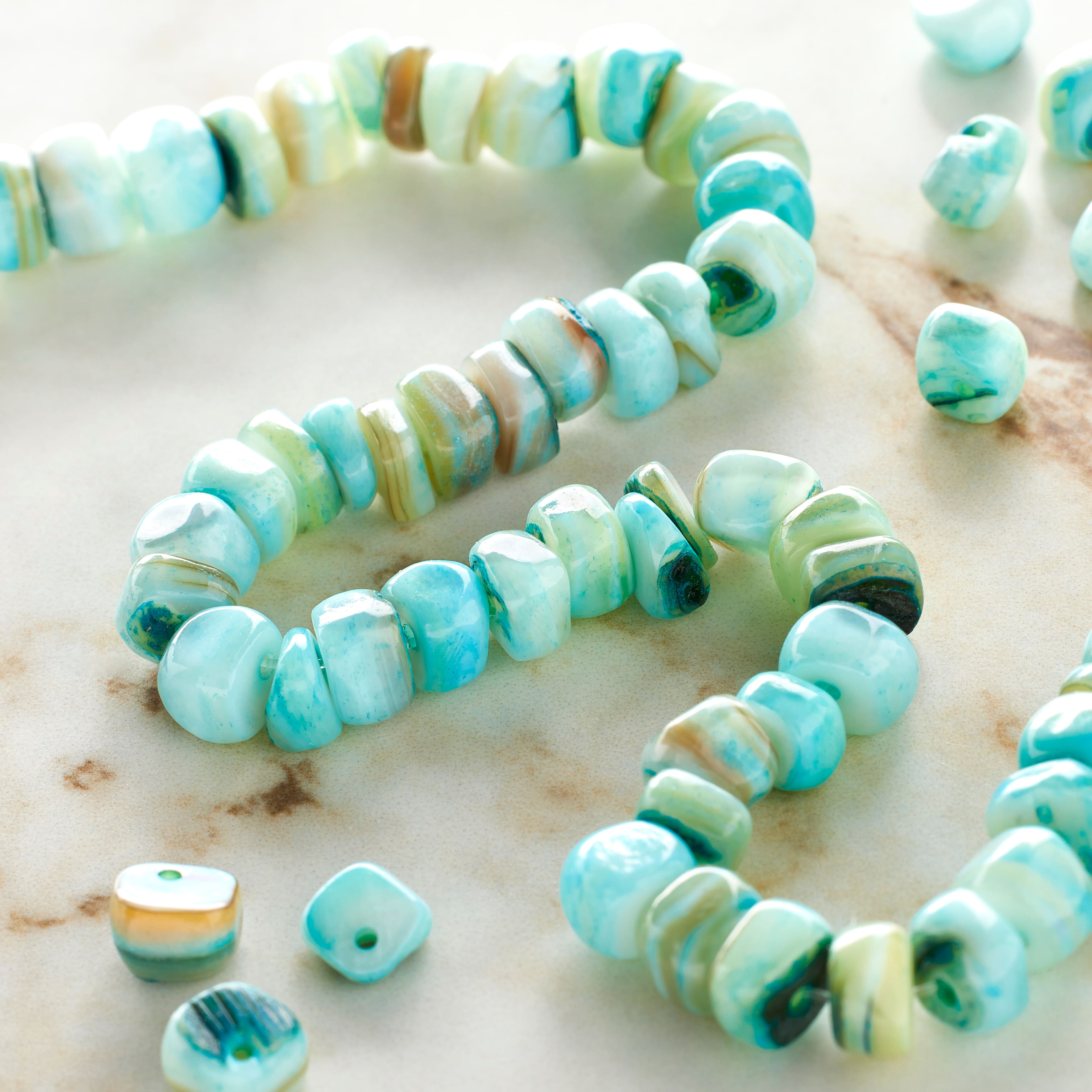 12 Pack: Aqua Shell Chip Beads, 5mm by Bead Landing™