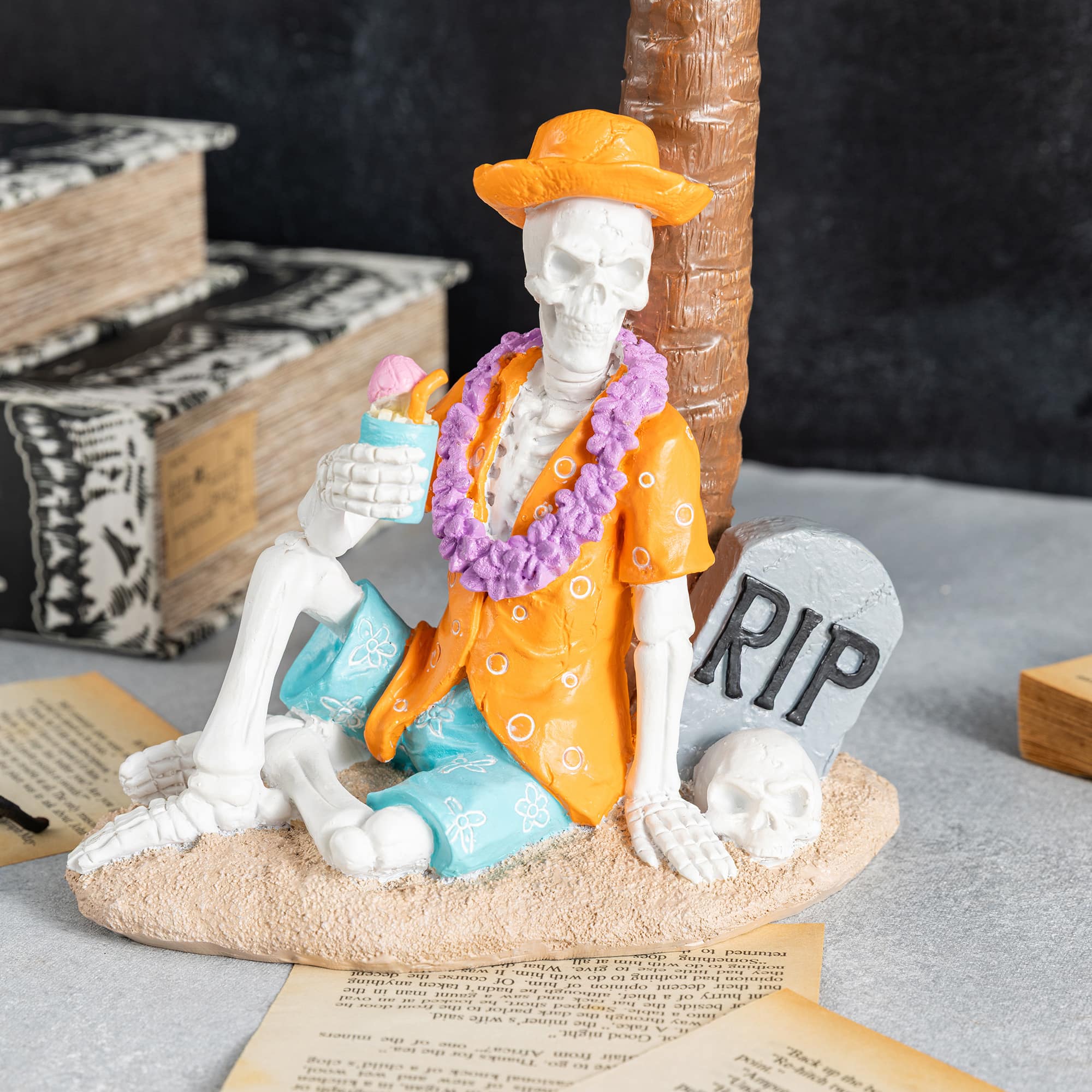 Glitzhome® 11.5" Halloween Polyresin Skeleton on Beach Table Decor