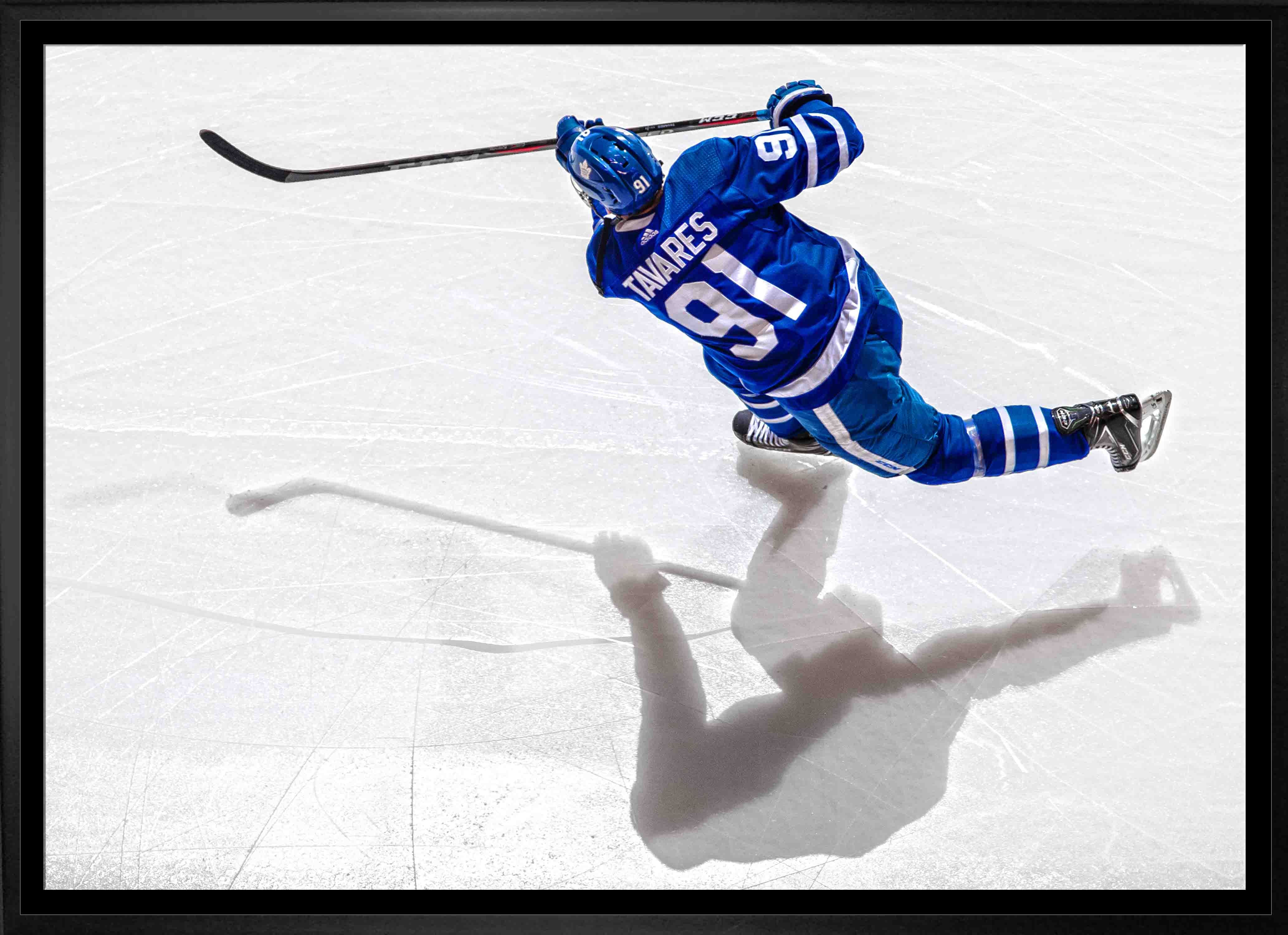 John Tavares Toronto Maple Leafs Framed 20" x 29" Shooting Canvas 22.5" x 31.5"