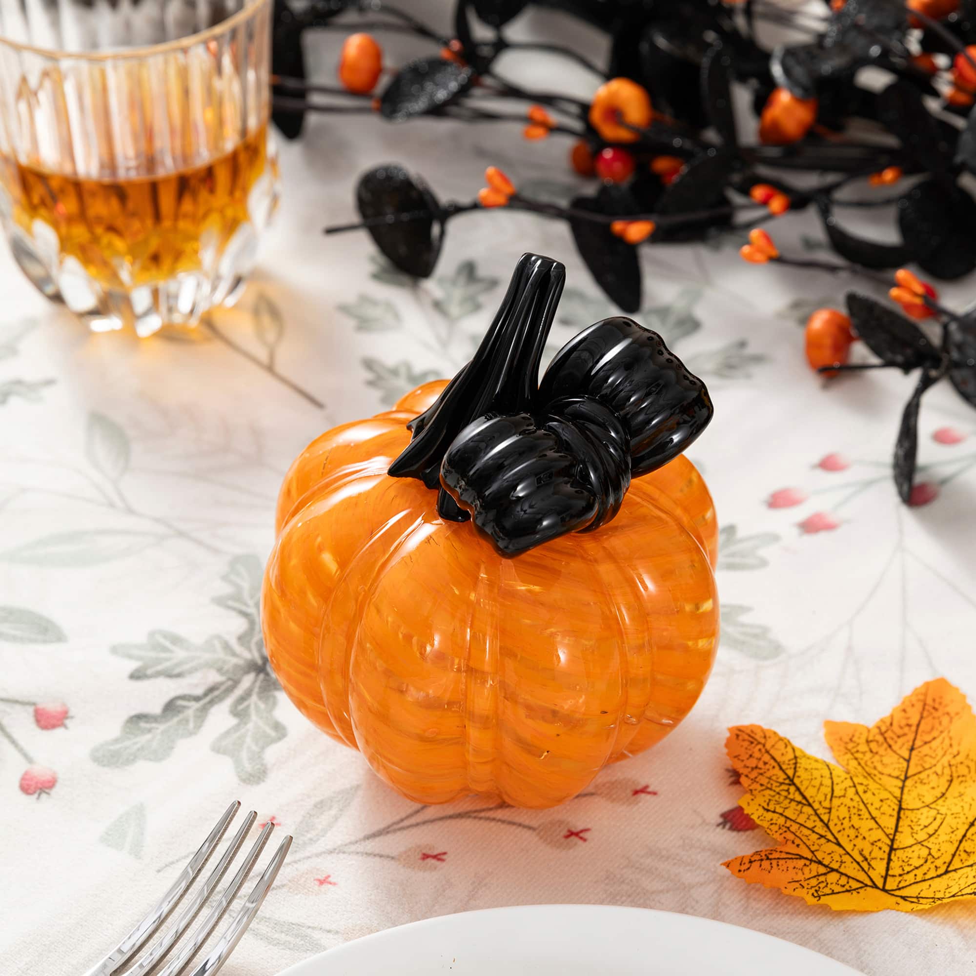 Glitzhome® 4.75" Halloween Striped Glass Pumpkin with Bow