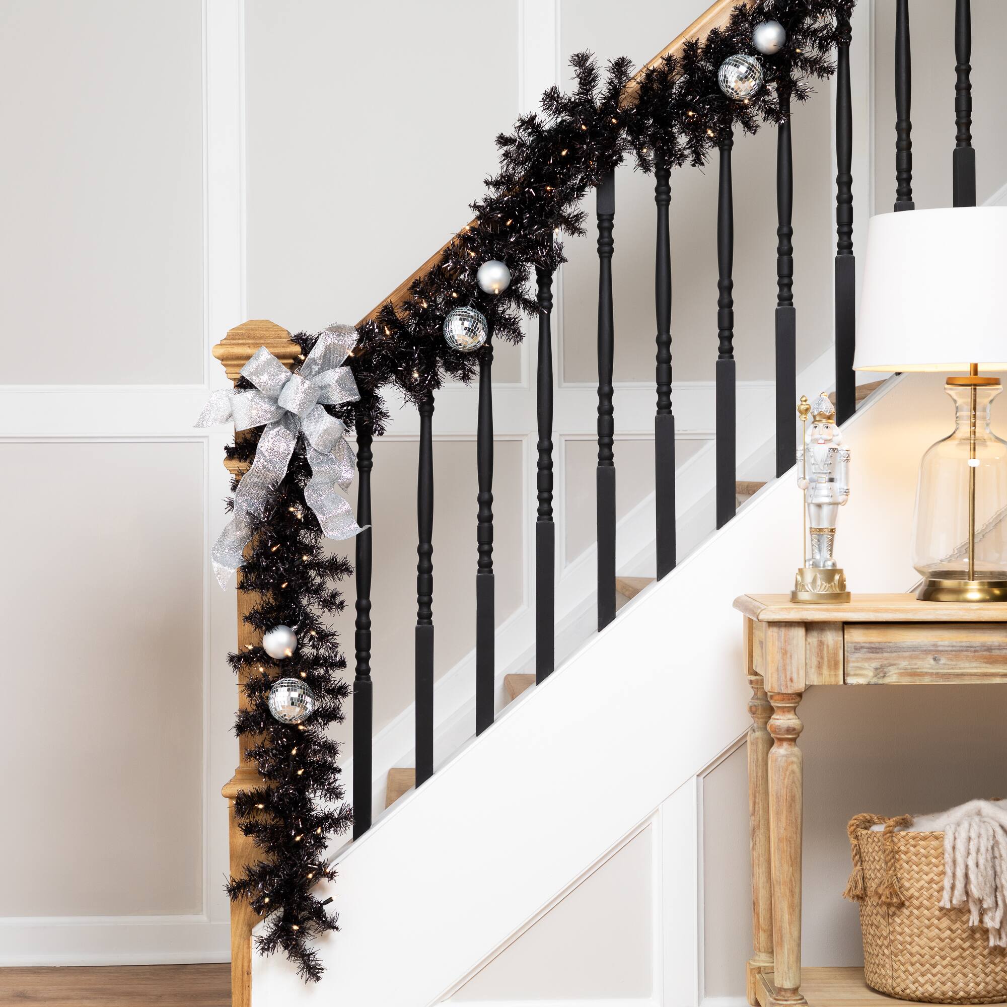 9ft. Pre-Lit Black Tinsel Garland, Clear Lights