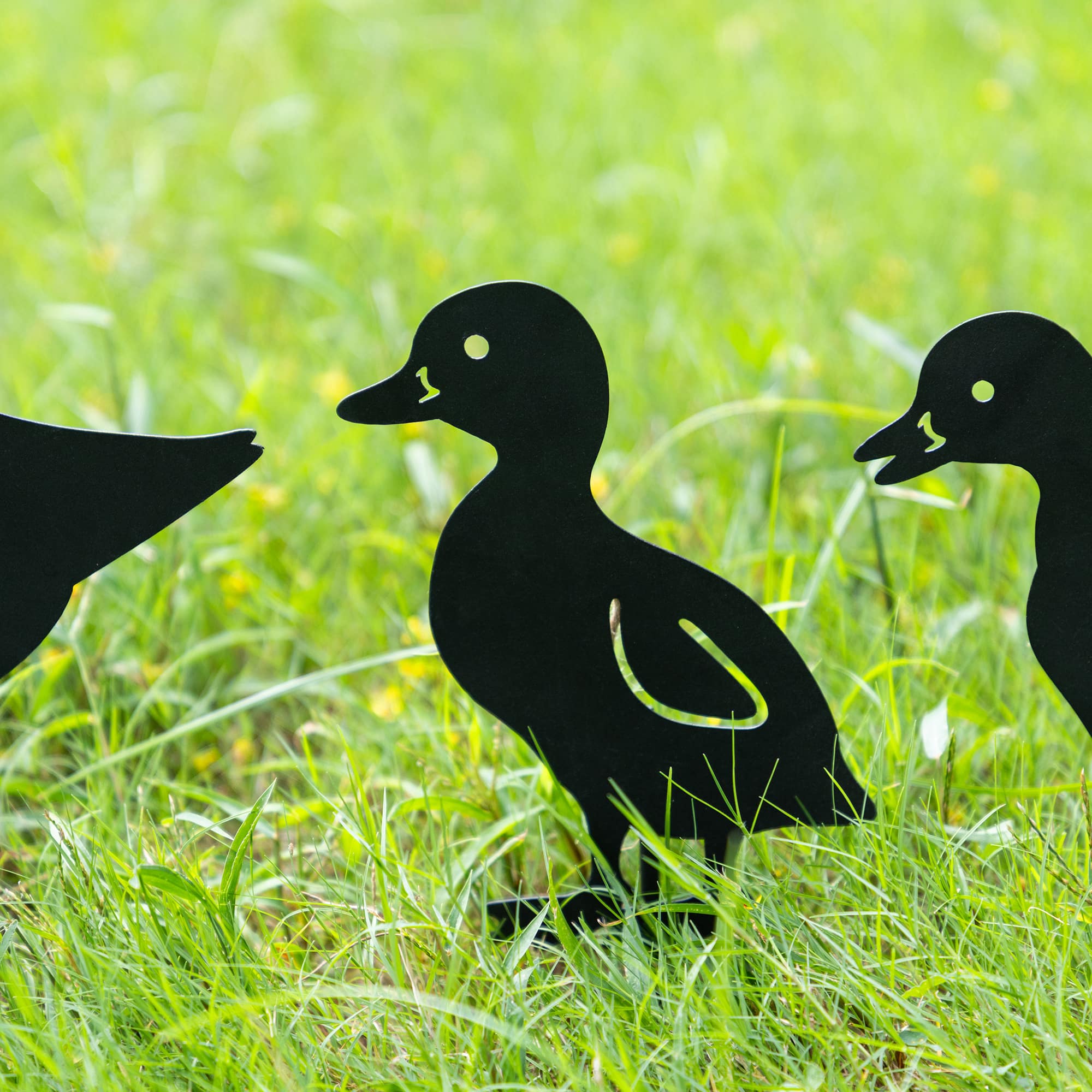 Glitzhome® 18" 2-in-1 Set of 4 Painted Metal Duck Silhouette Garden Picks & Wall Decor