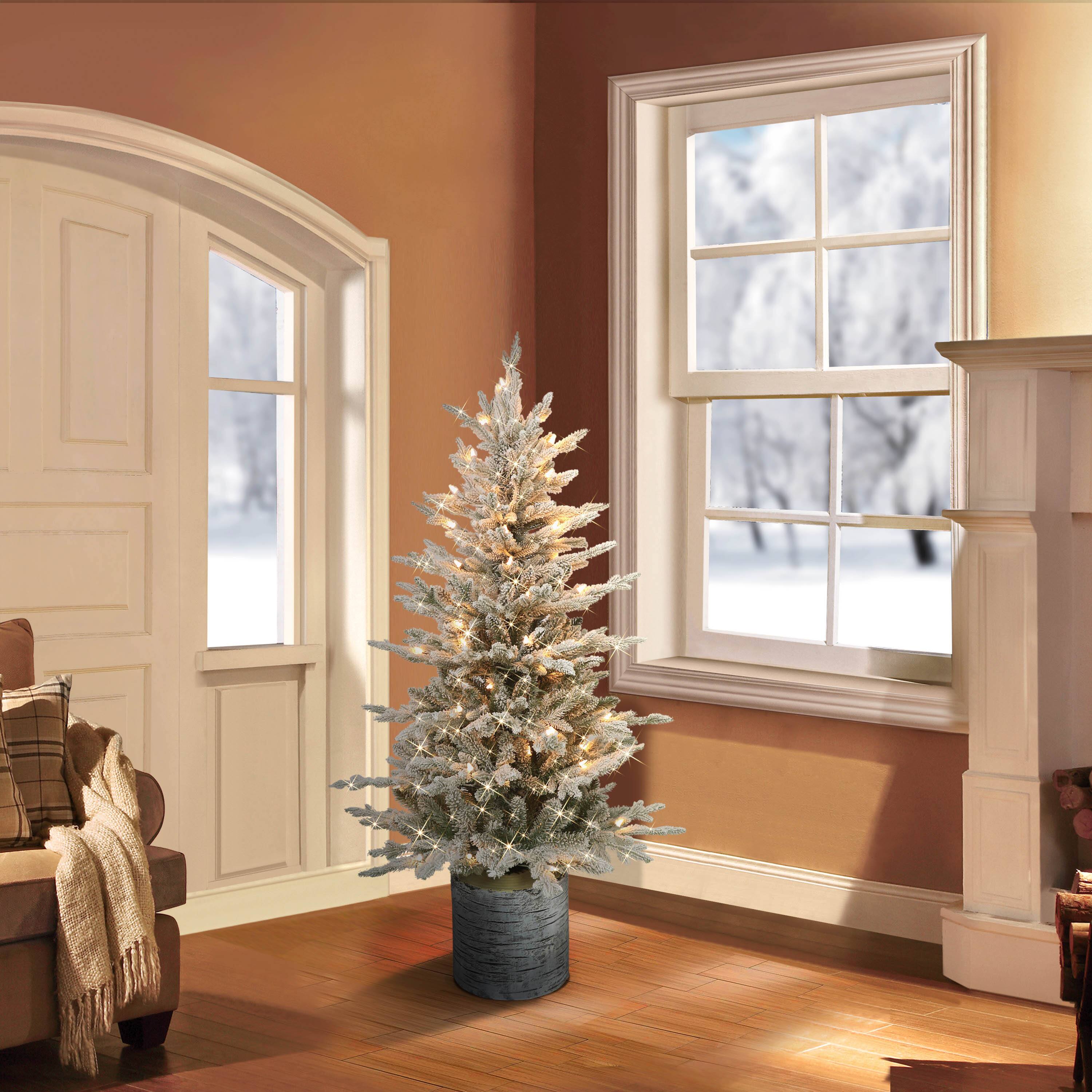 6 Pack: 4.5ft. Pre-Lit Flocked Arctic Fir Artificial Christmas Tree in Stump Planter, Clear Lights
