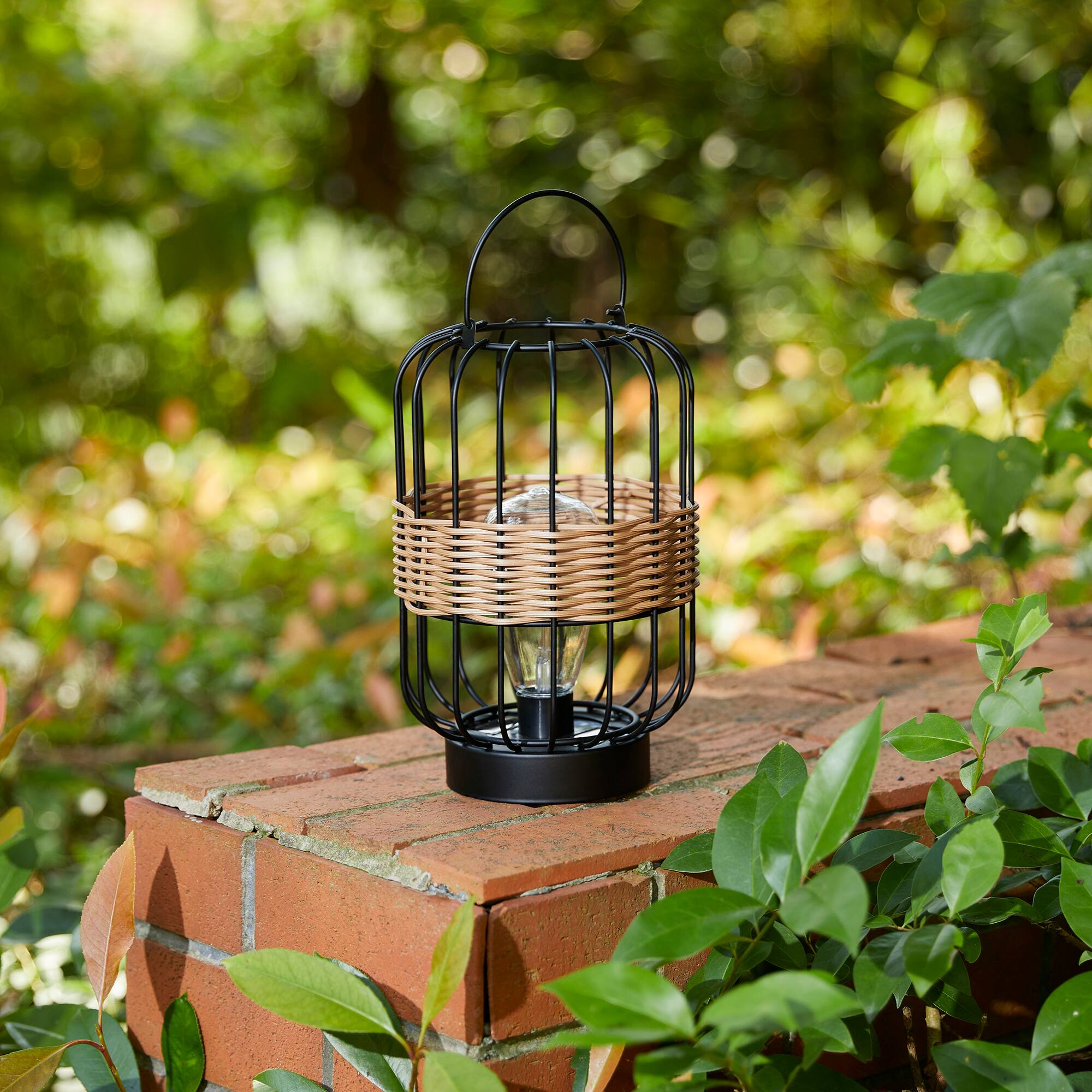 Glitzhome® 11.75" Metal Wire Faux Rattan Solar Powered Outdoor Lantern