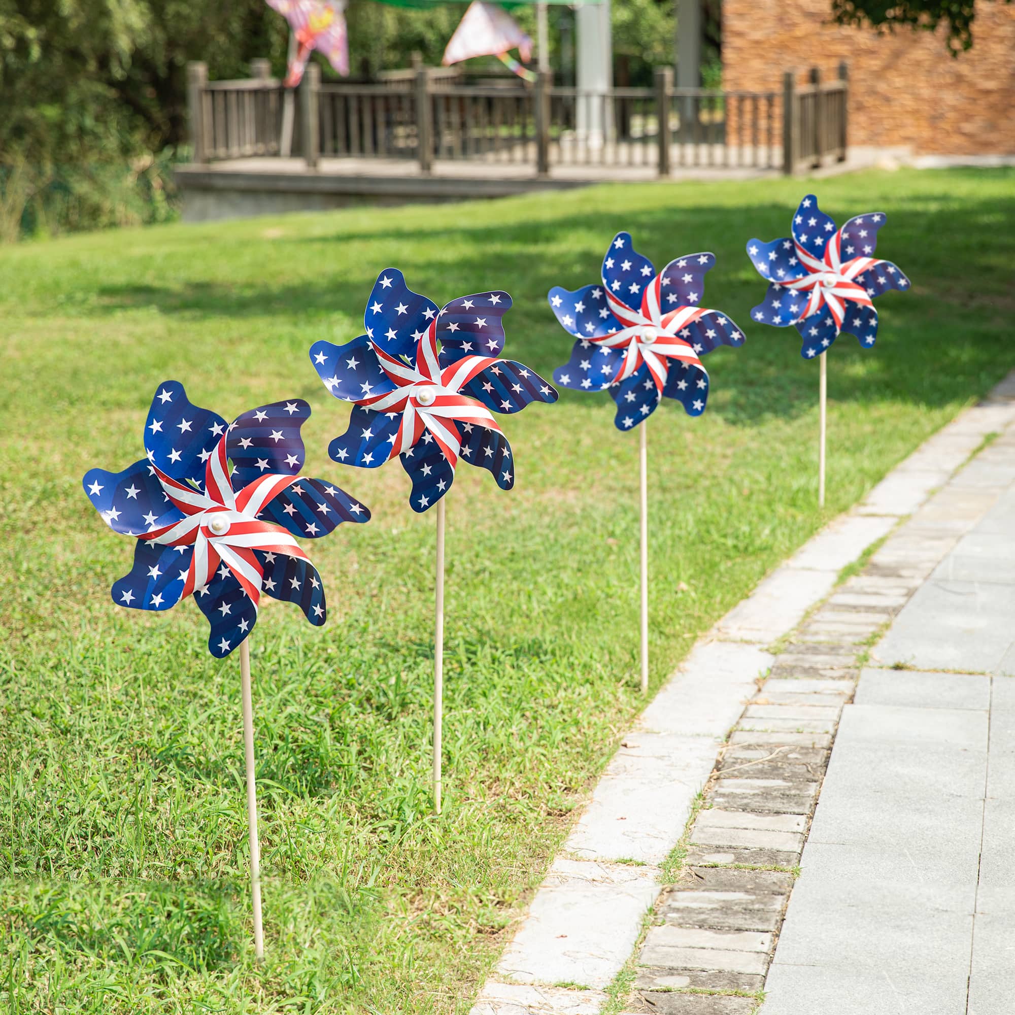 Glitzhome® 43.2" Stars & Stripes Patriotic Windmills, 4ct.