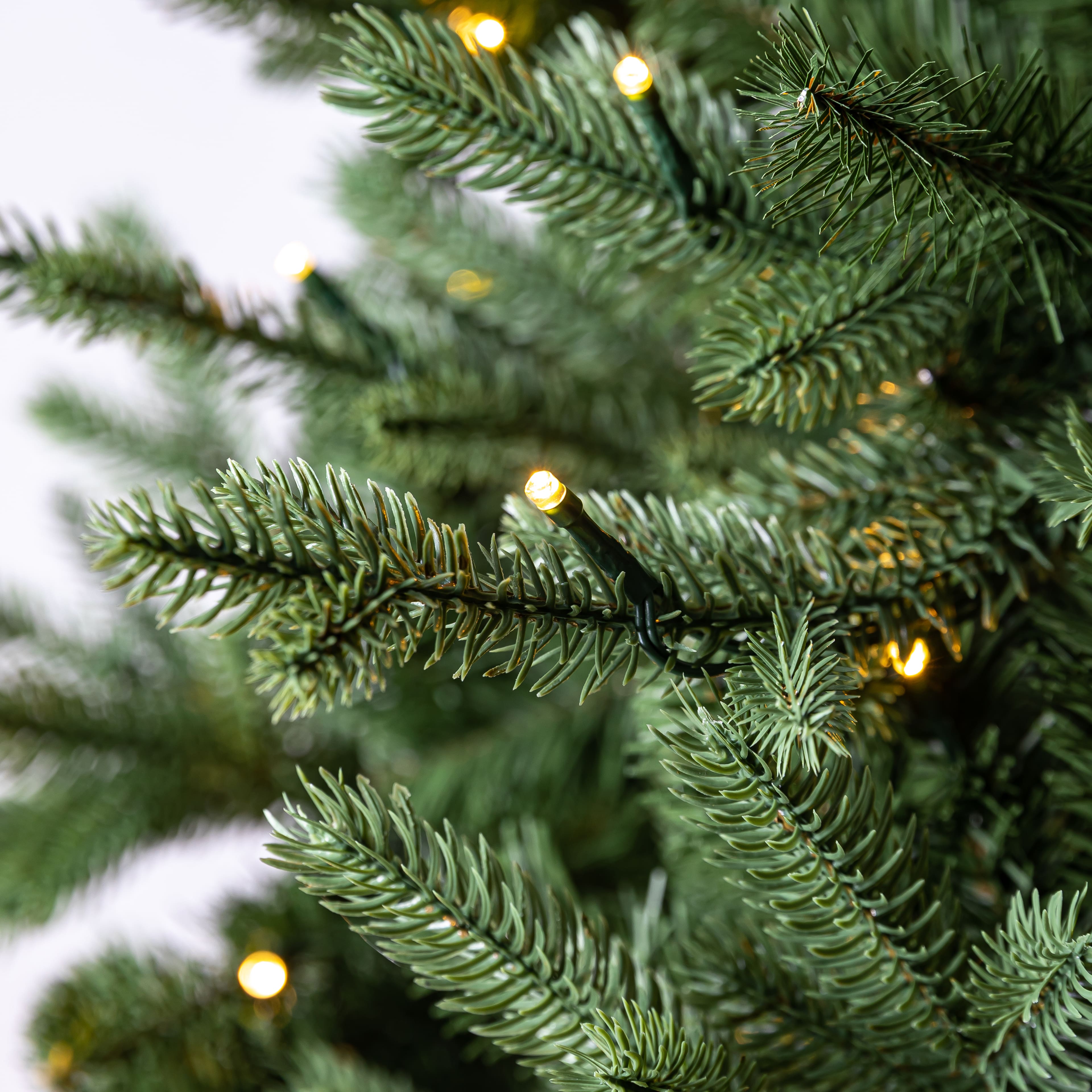 7.5ft. Pre-Lit Collins Fir Artificial Christmas Tree, Color Changing Mini LED Lights by Ashland® - Includes a Tree Storage Bag