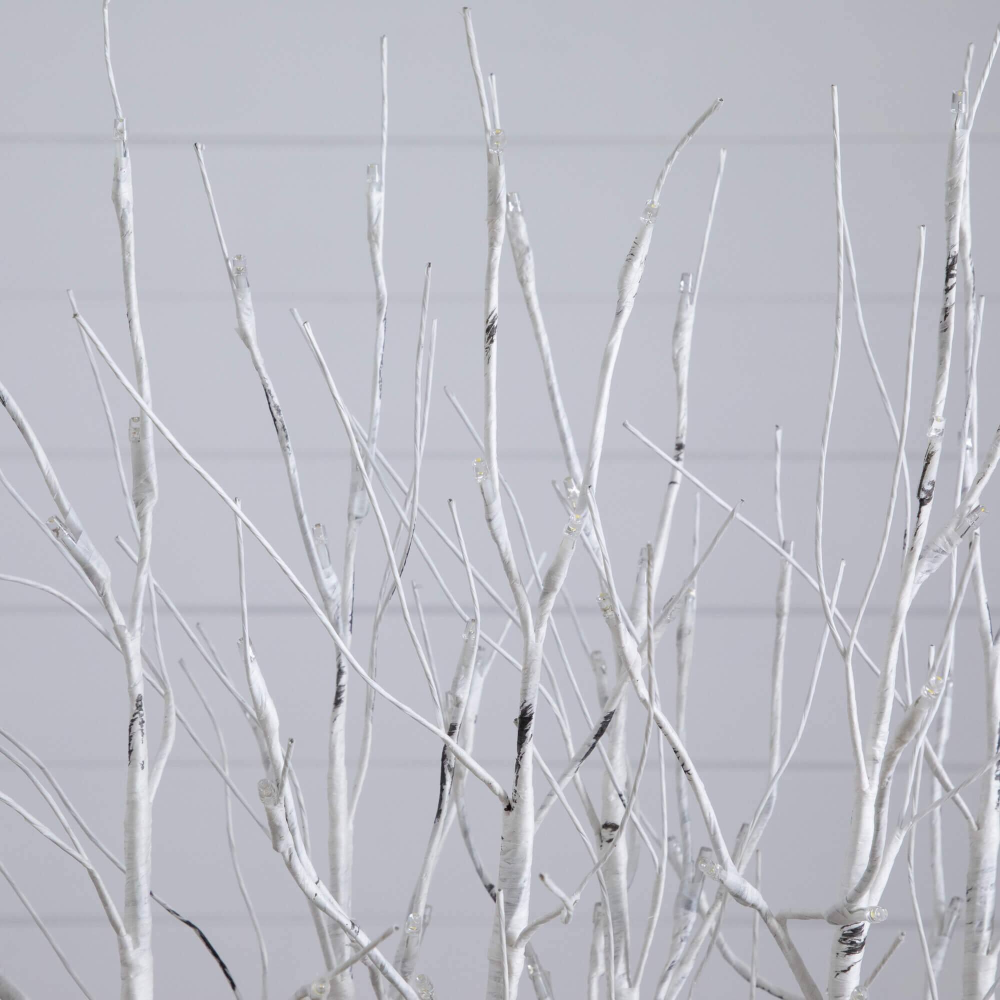 2ft. Pre-Lit Artificial White Birch Centerpiece with 84 LED Lights