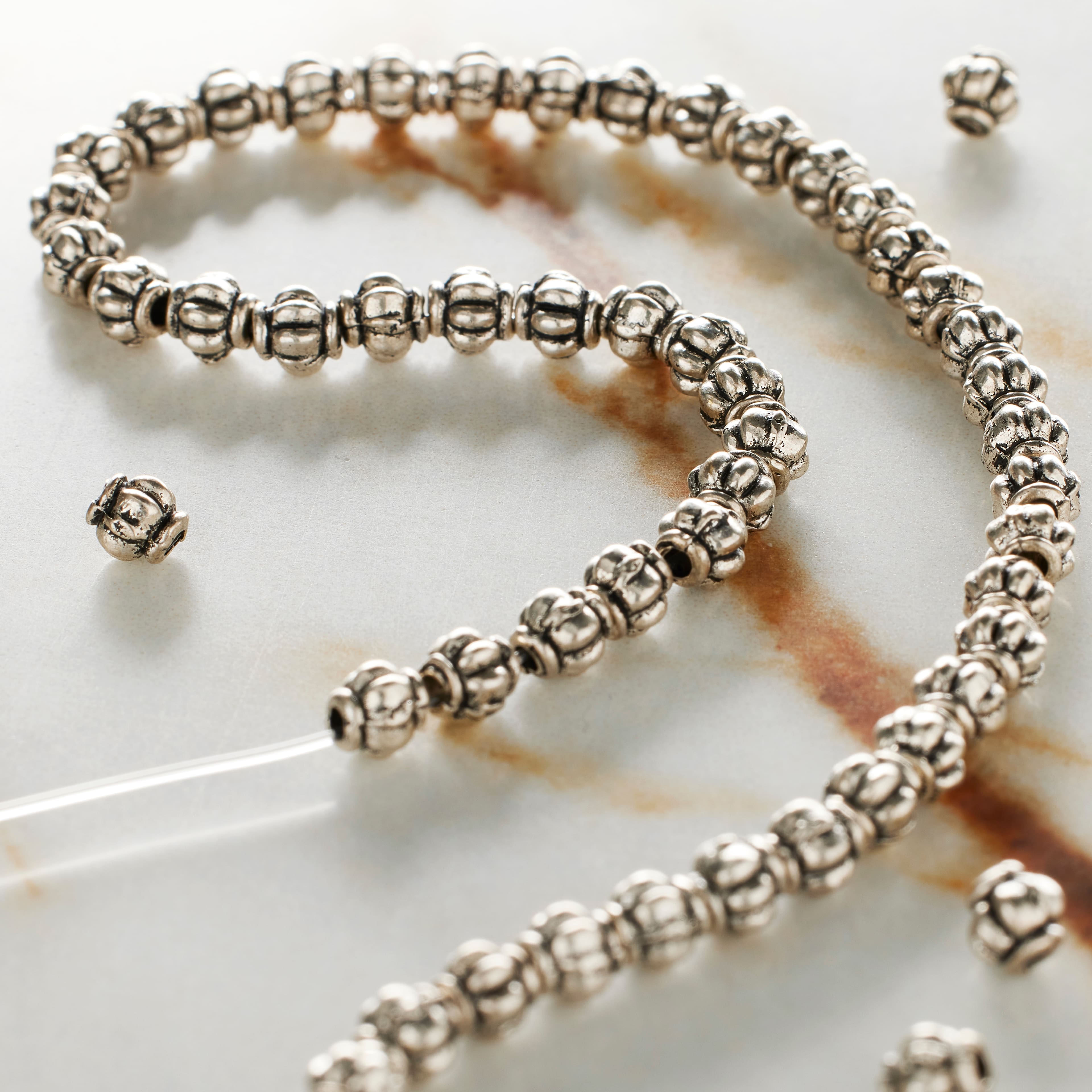 12 Pack: Antique Silver Melon Metal Rondelle Beads, 4mm by Bead Landing™