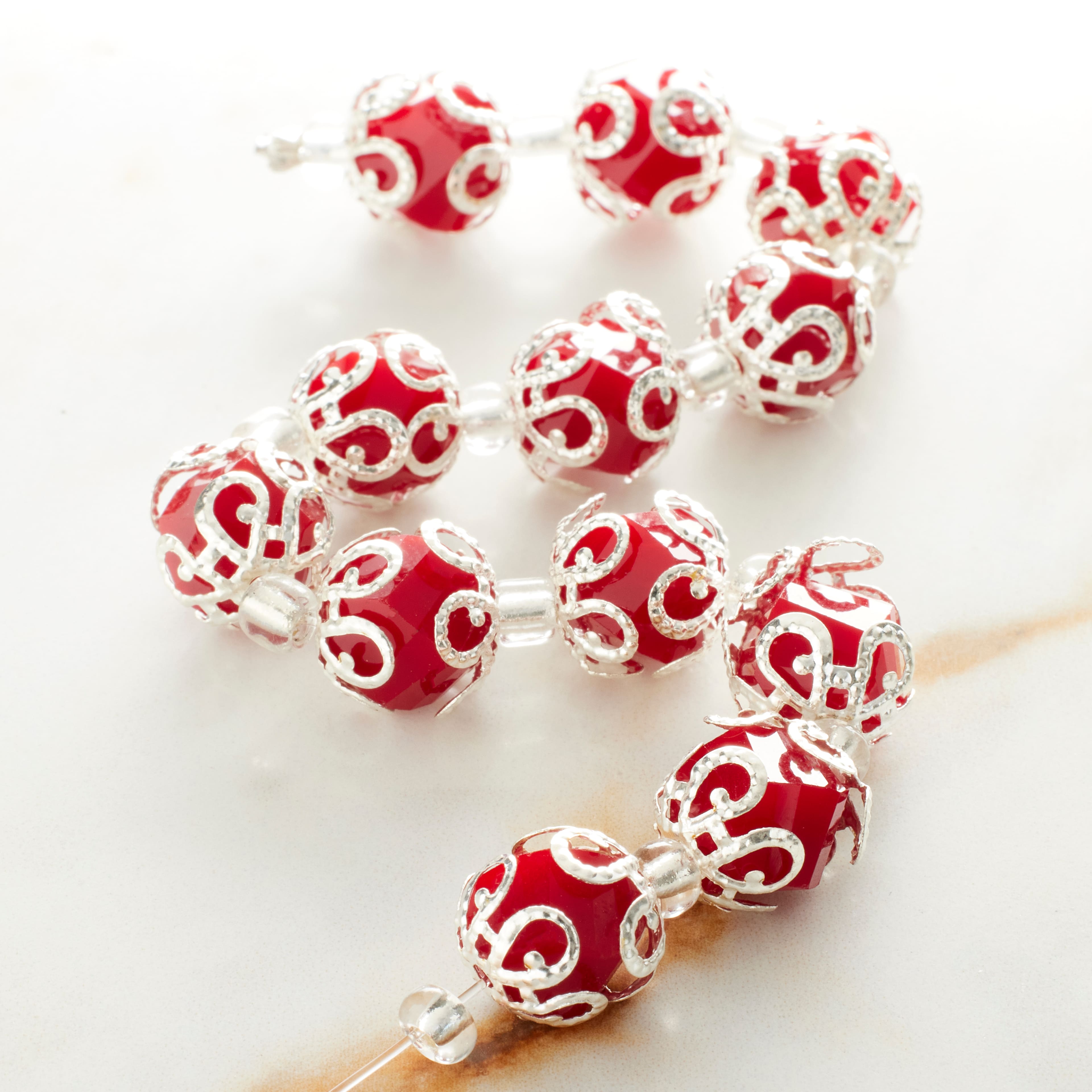 12 Pack: Red Faceted Glass Bead With Bead Cap, 10mm by Bead Landing™