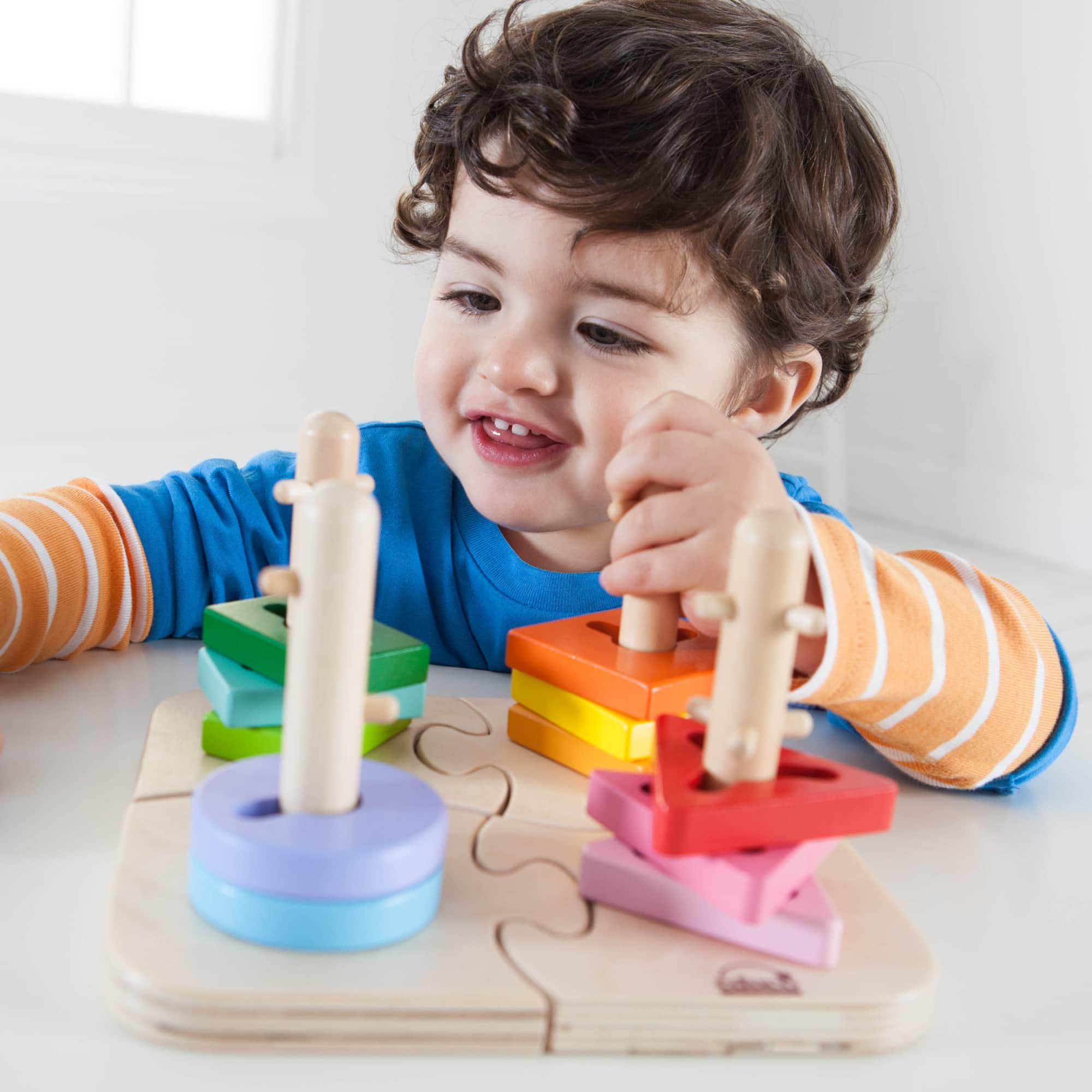Hape Wooden Toddler Stacking Shape Peg Puzzle