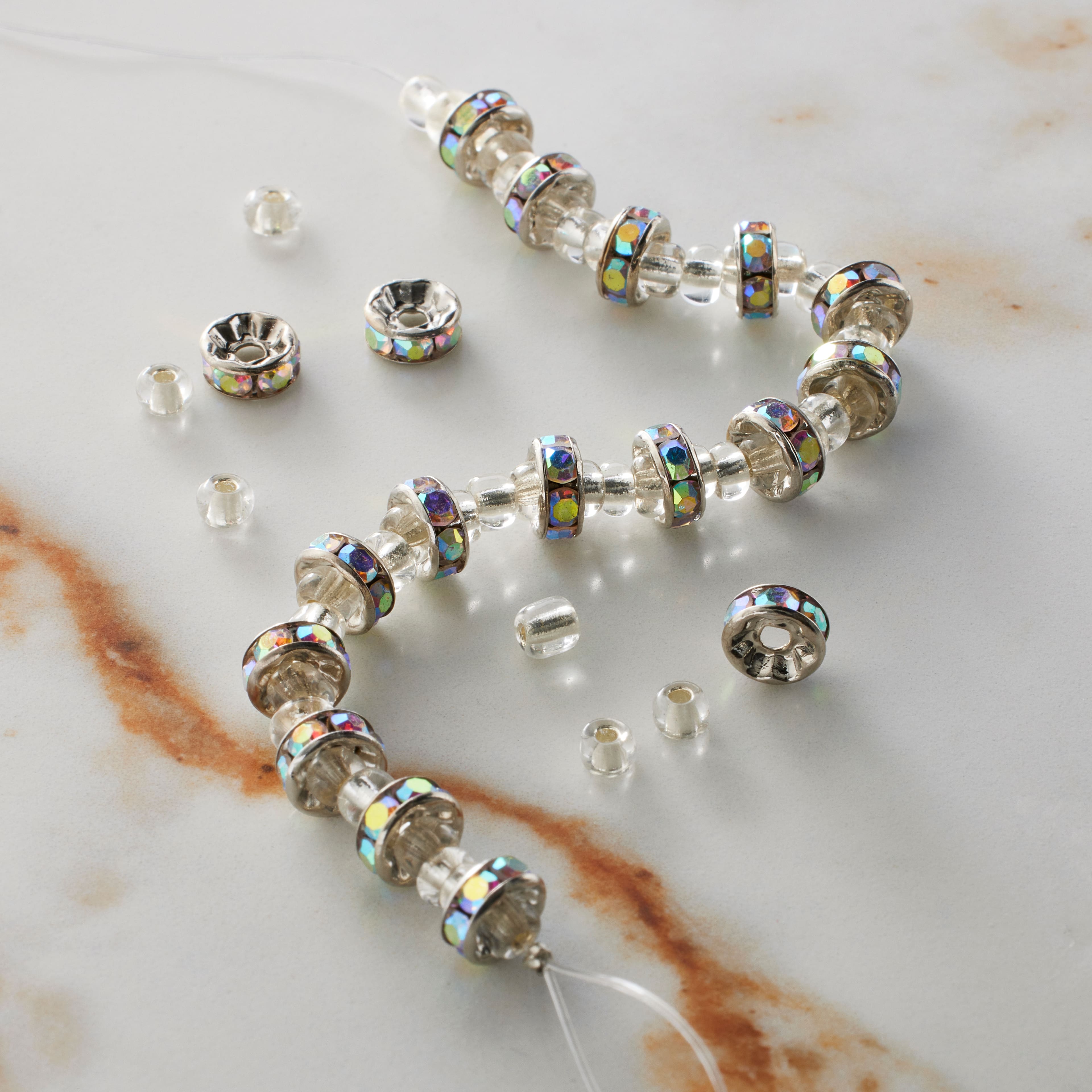 12 Pack: Glass Rhinestone & Metal Rondelle Beads, 6.7mm by Bead Landing­™