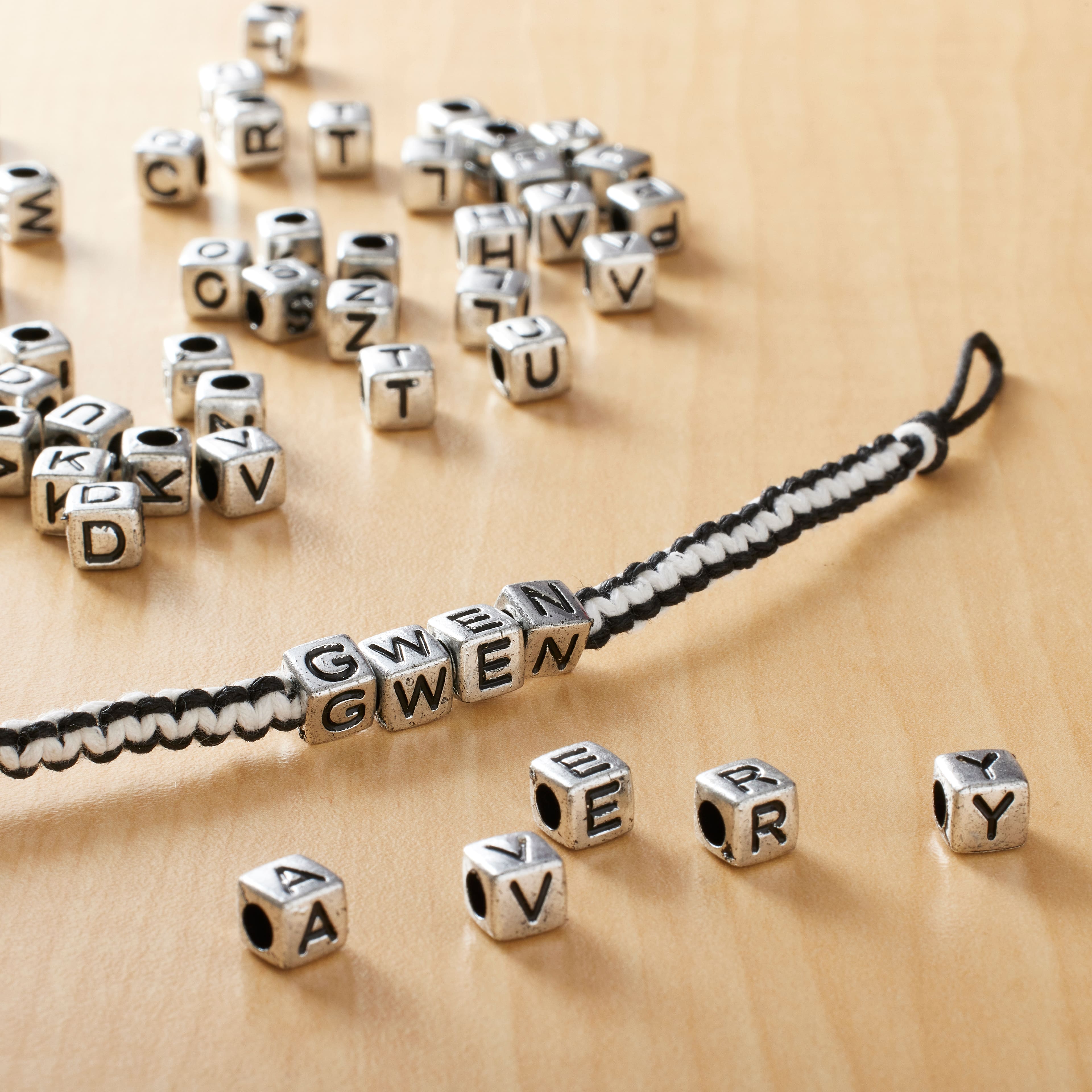 12 Packs: 340 ct. (4,080 total) Silver Alphabet Cube Beads by Creatology™, 6.5mm