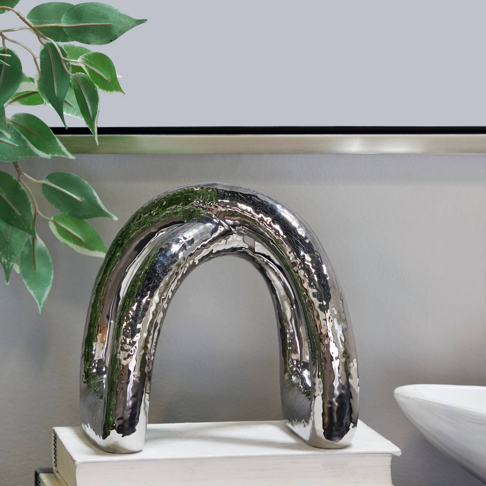 CosmoLiving by Cosmopolitan 8" Porcelain Arched Abstract Sculpture