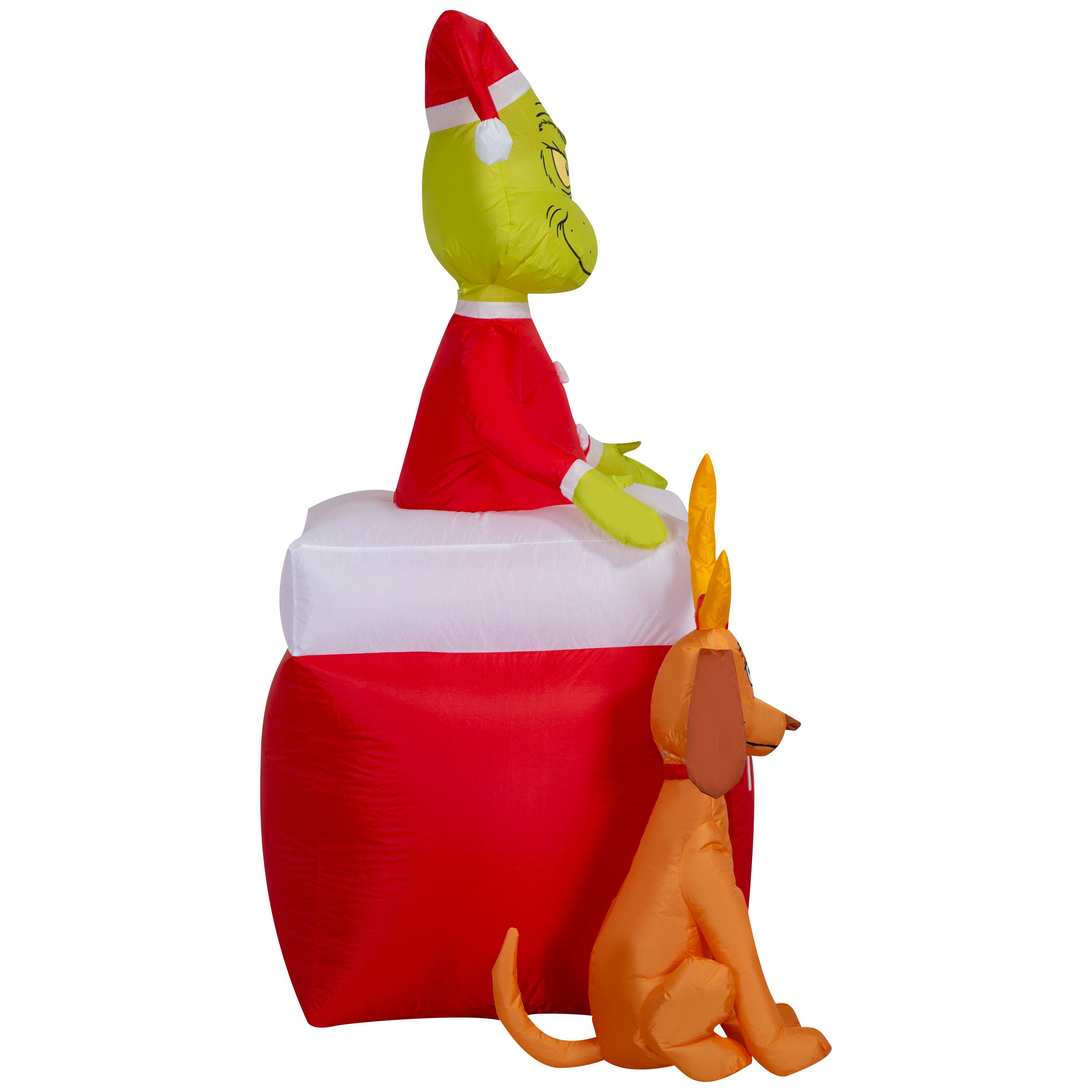 5.5ft. Airblown® Inflatable Dr. Seuss™ The Grinch™ Out of Chimney with Max Christmas Light Scene