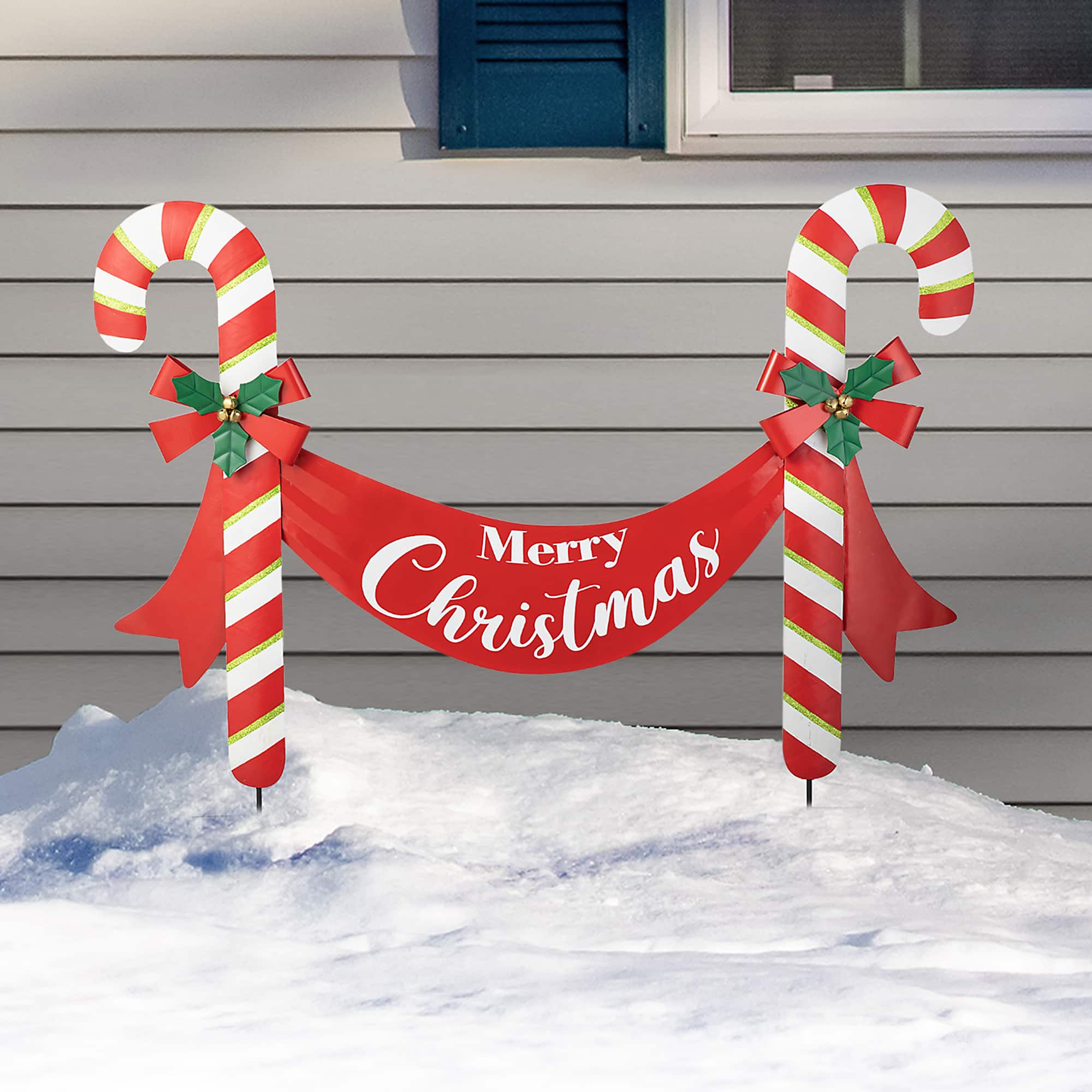 Glitzhome® 3ft. Merry Christmas Candy Cane Metal Yard Stake