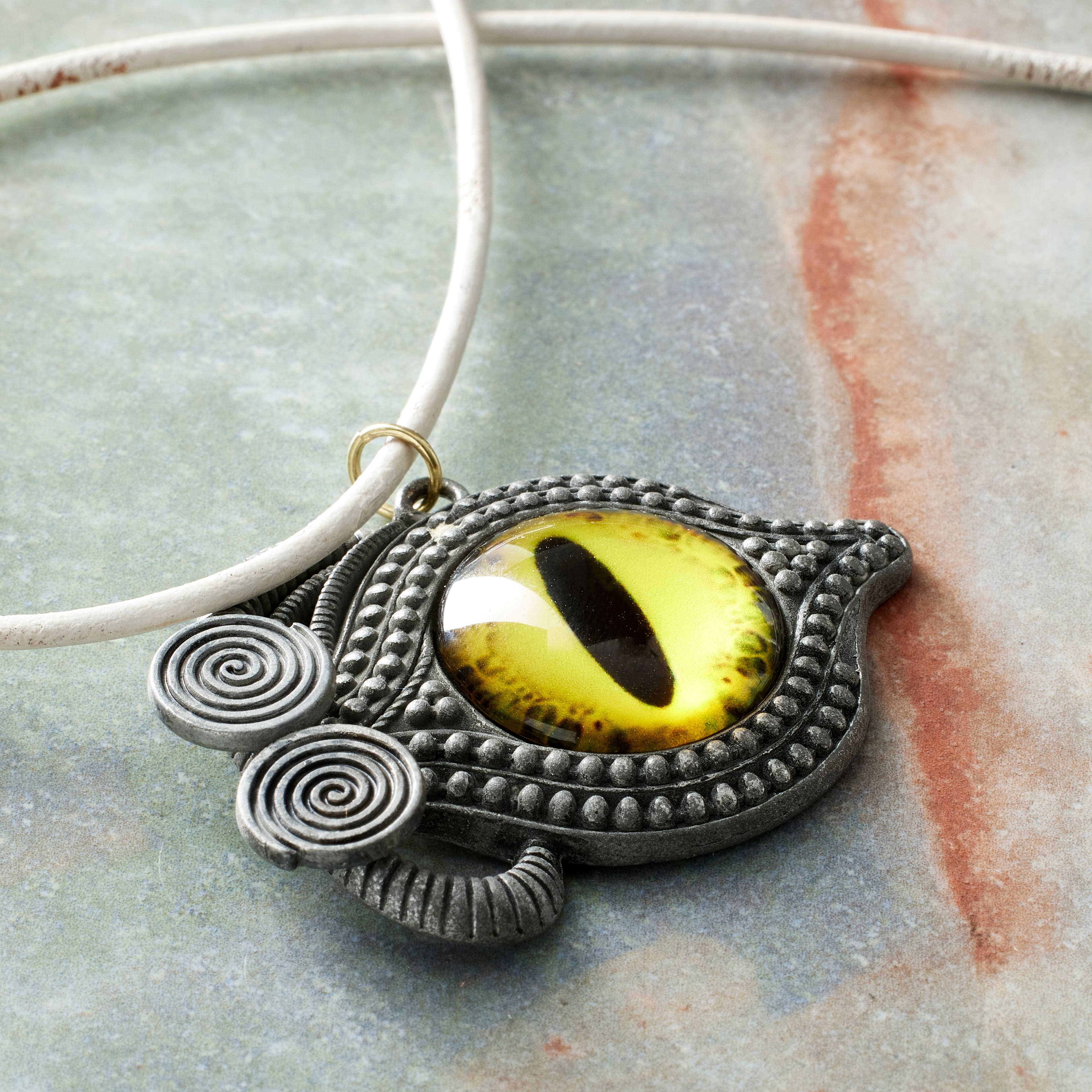 Found Objects Yellow Eye Pendant by Bead Landing™