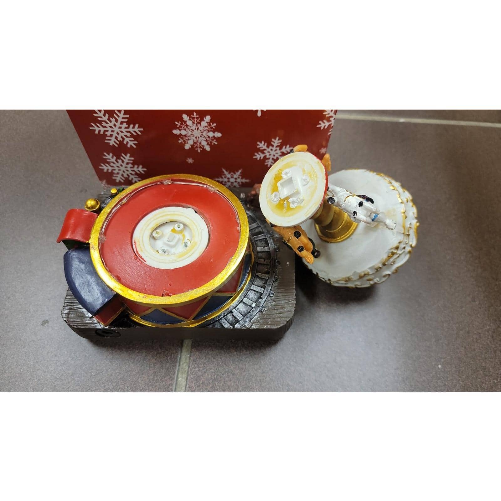 11.75" x 7.75" Multicolor Christmas Village Musical Carousel Holiday Decoration