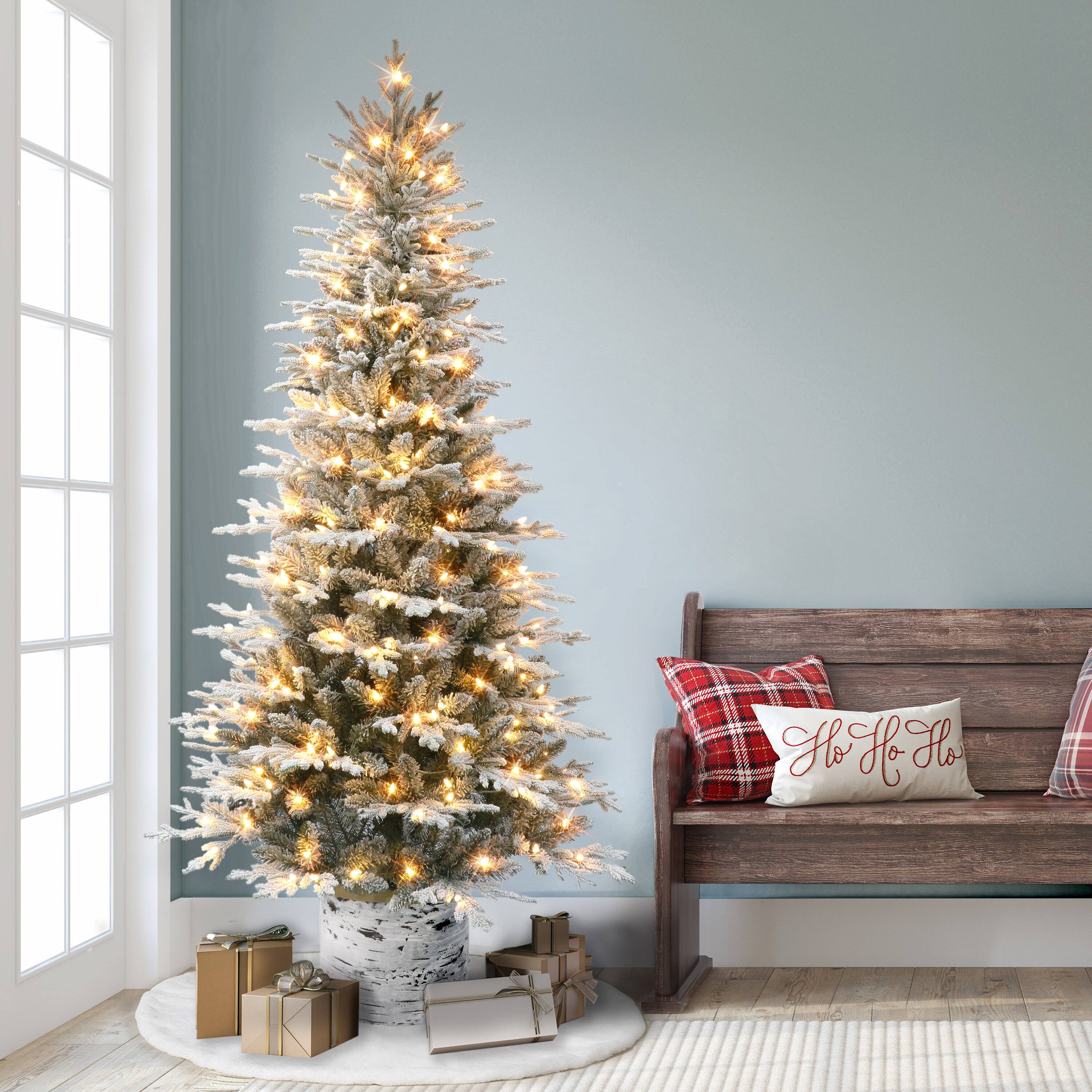 7.5ft. Pre-Lit Flocked Arctic Fir Potted Artificial Christmas Tree, White LED Lights