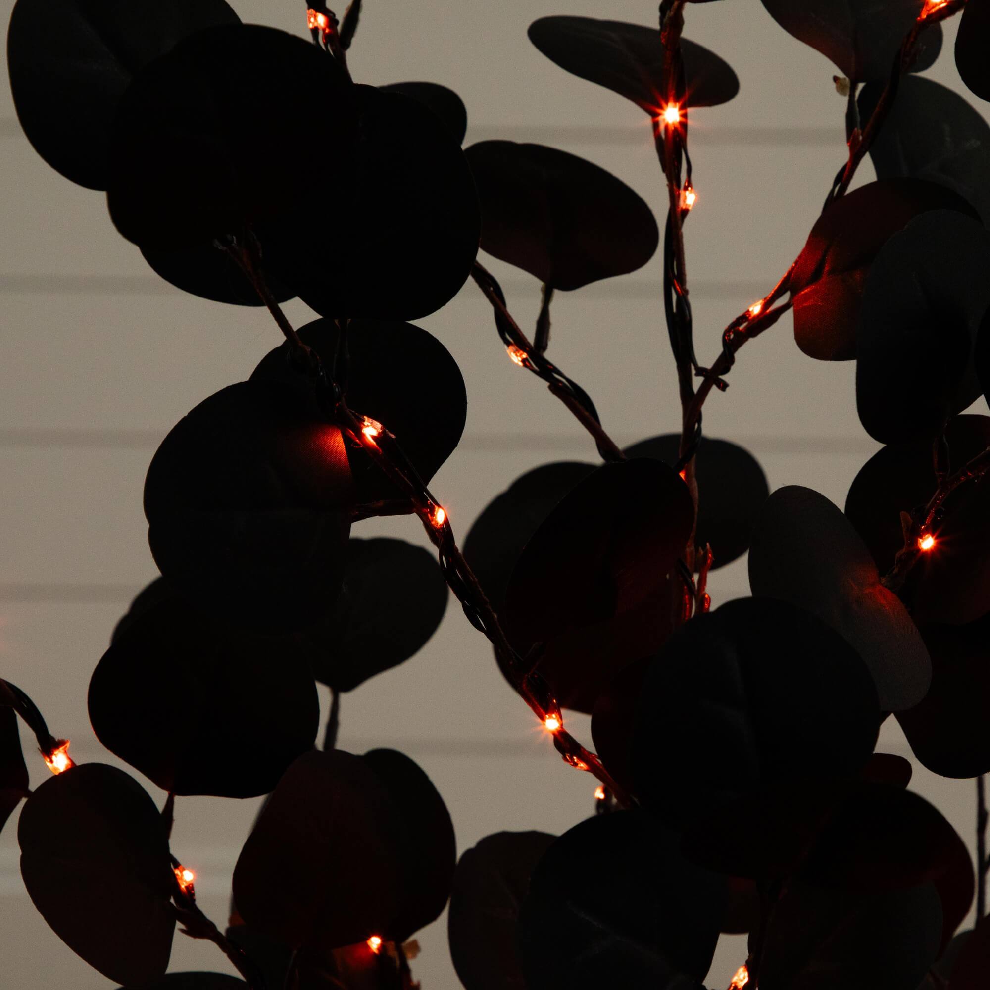 3ft. Pre-Lit Artificial Halloween Black Eucalyptus Tree with 80 Orange & Purple LED Lights