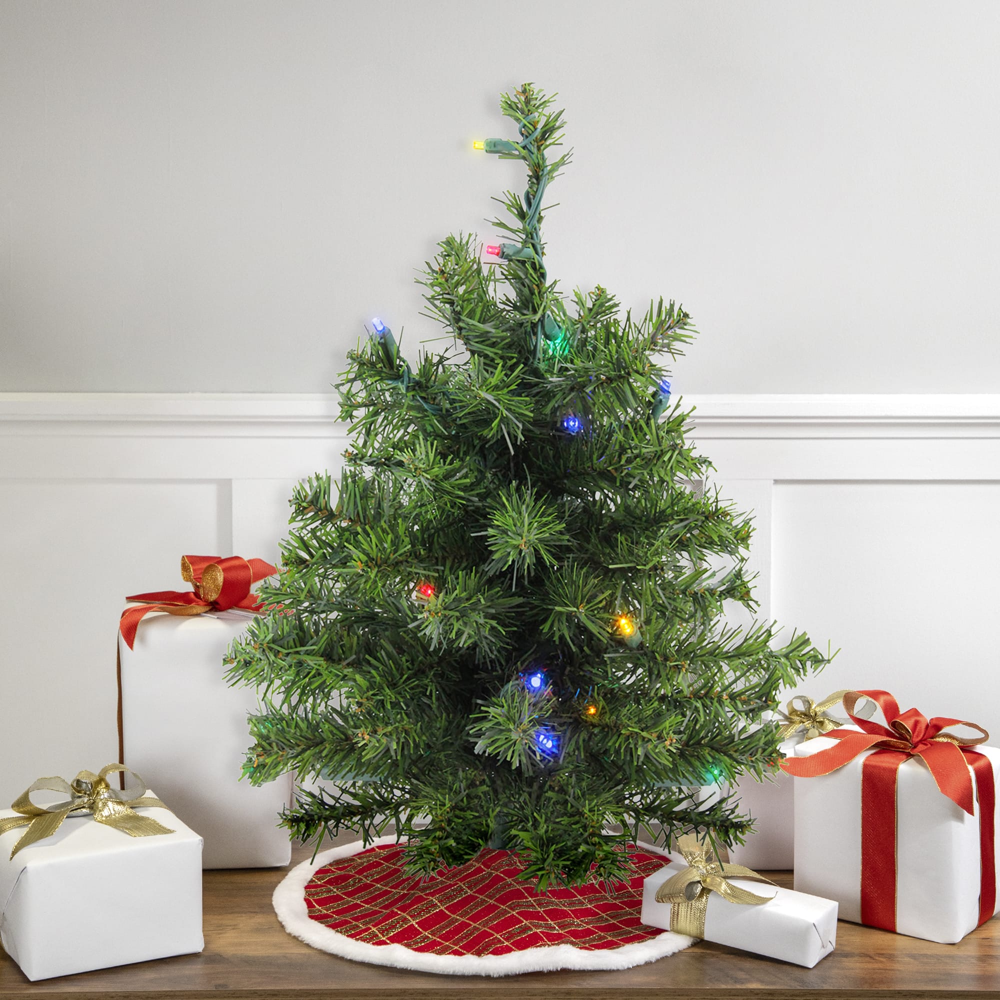 18" Pre-Lit Canadian Pine Artificial Christmas Tree, Multicolor LED Lights By Northlight in Green | Michaels®