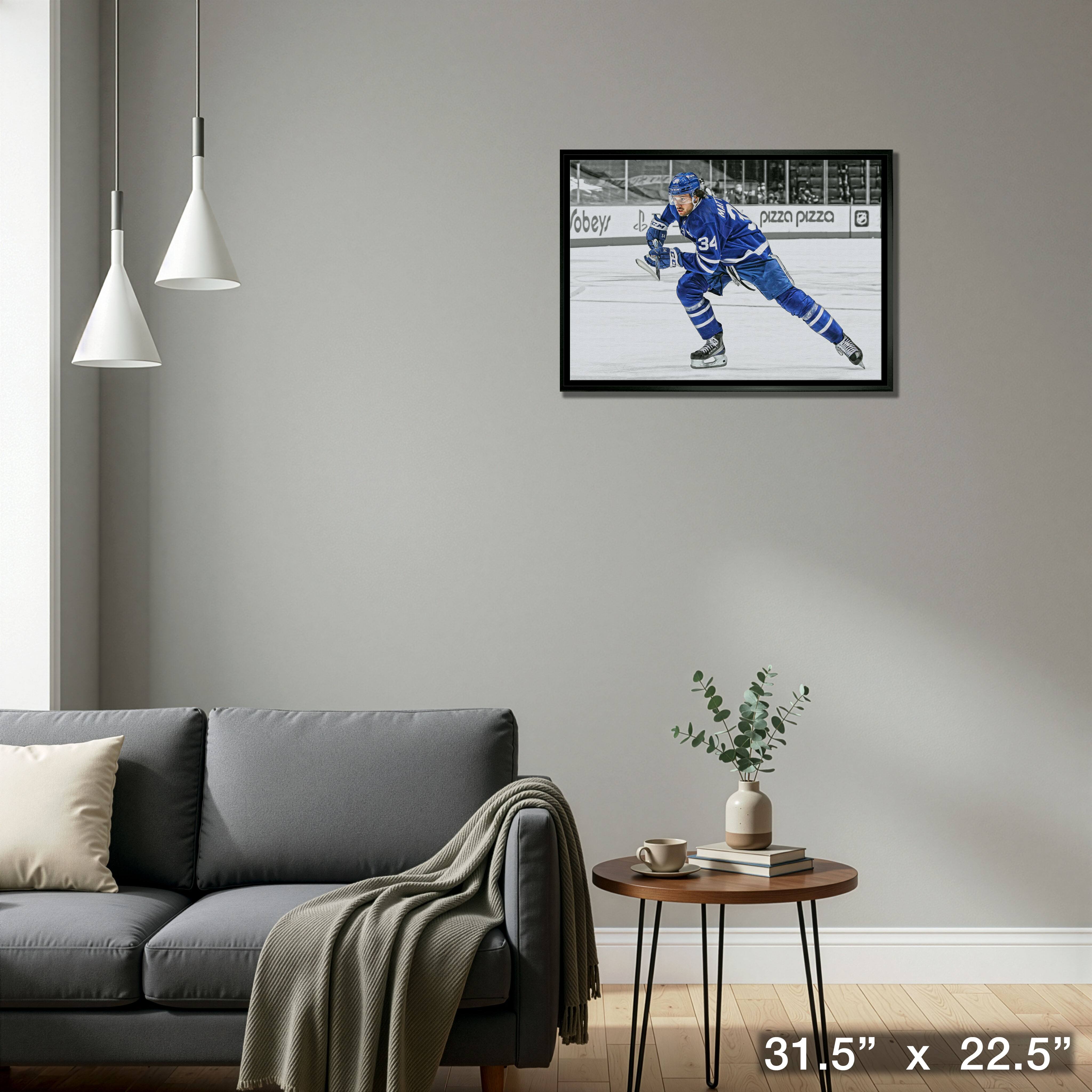 Auston Matthews Toronto Maple Leafs Framed 20" x 29" Hustling Spotlight Canvas 31.5" x 22.5"