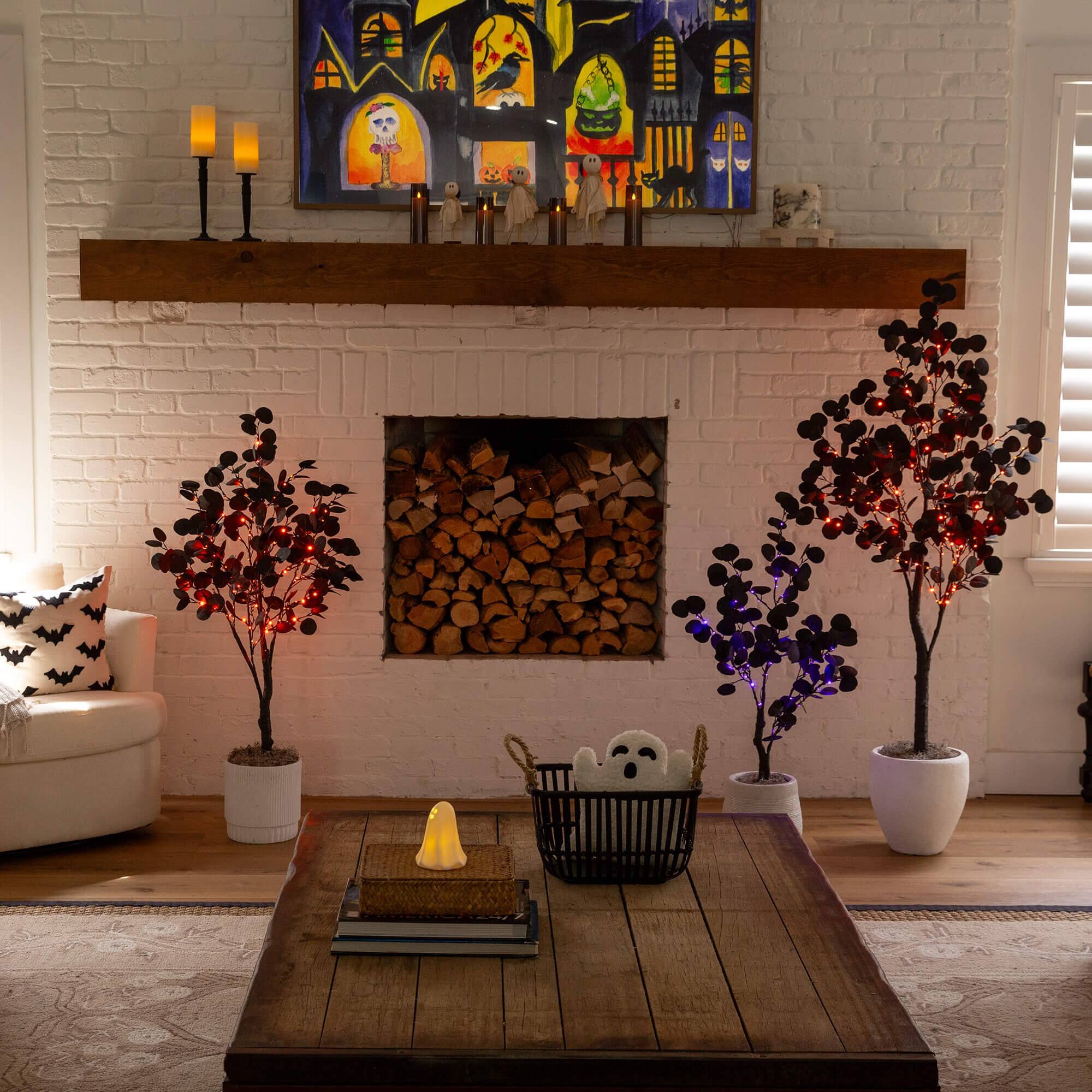4ft. Pre-Lit Artificial Halloween Black Eucalyptus Tree with 160 Orange & Purple LED Lights