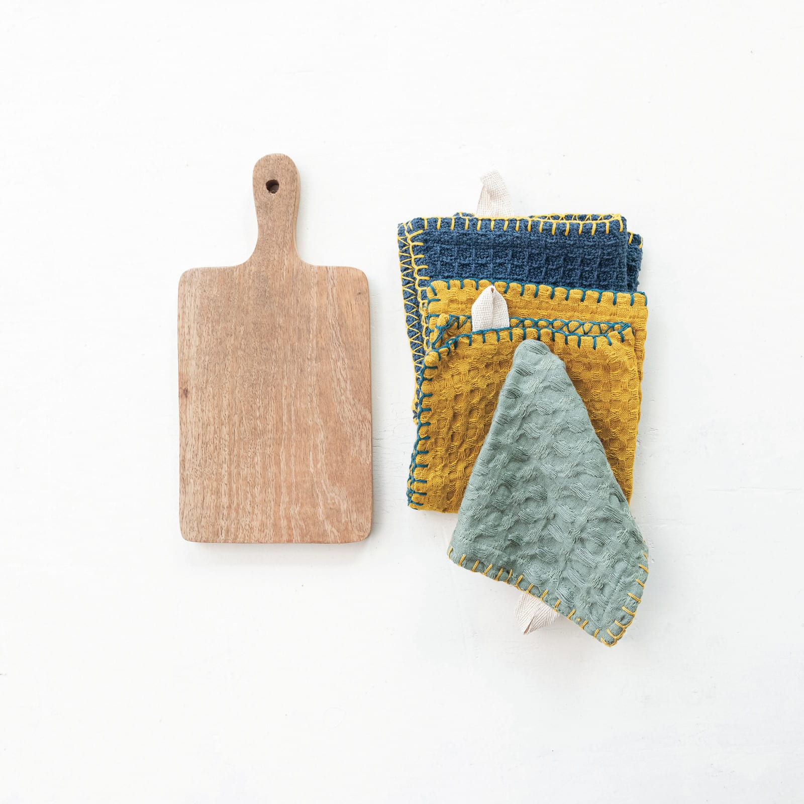 Hello Honey® Multicolor Cotton Waffle Weave Dishcloths on a Mango Wood Board