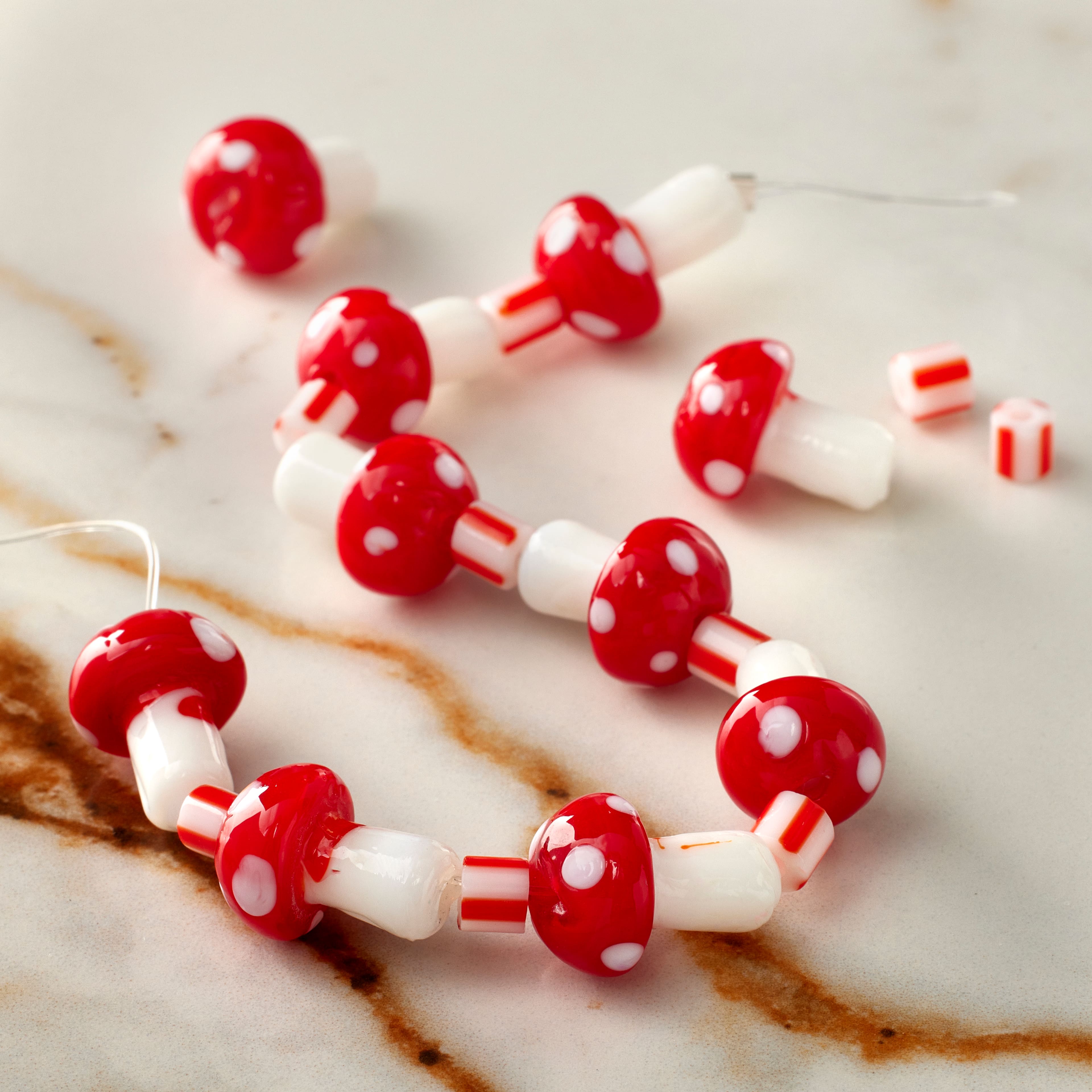 12 Packs: 10 ct. (120 total) Red Mushroom Lampwork Glass Bead Mix by Bead Landing™