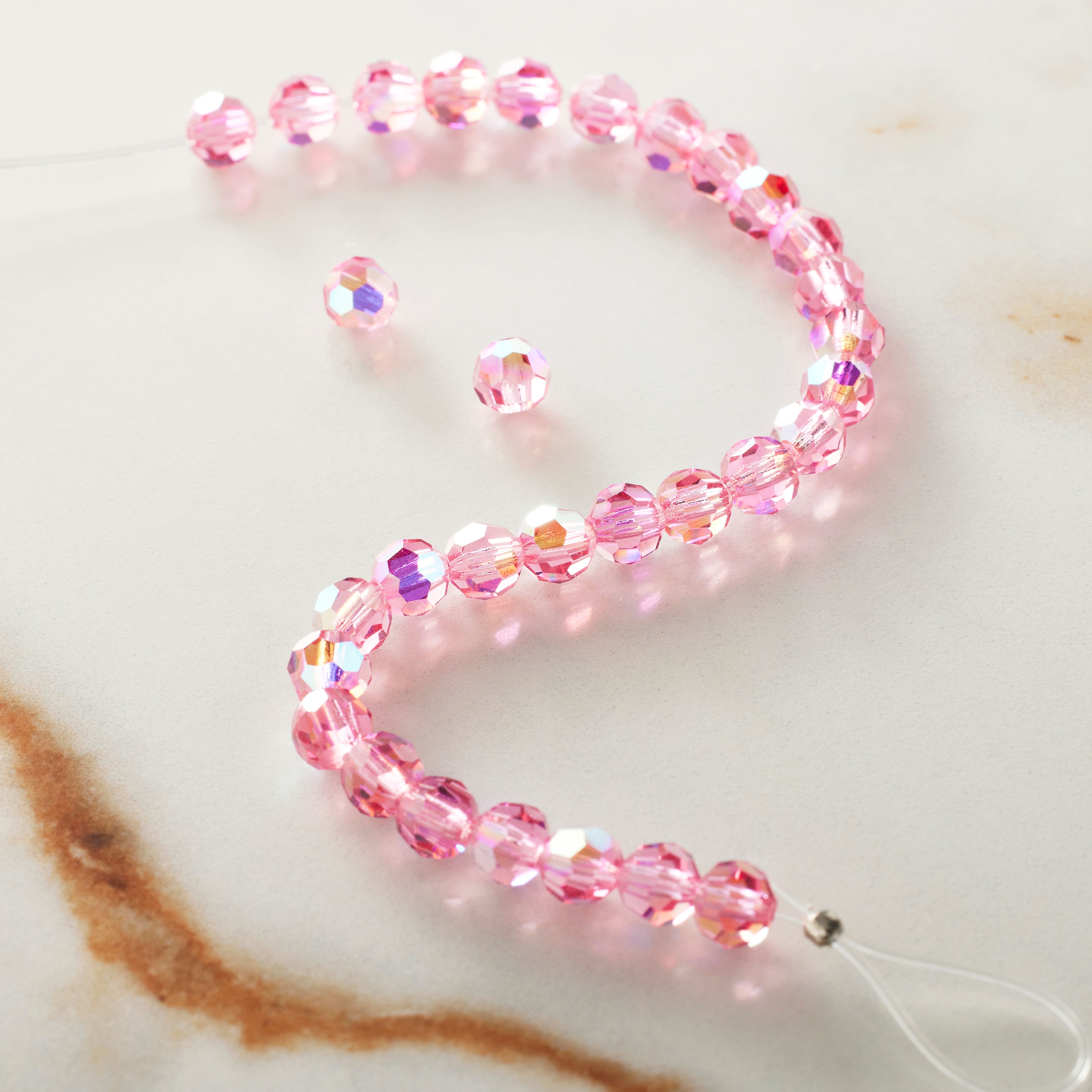 12 Packs: 31 ct. (372 total) Preciosa Glass Crystal Round Beads, 4mm by Bead Landing™