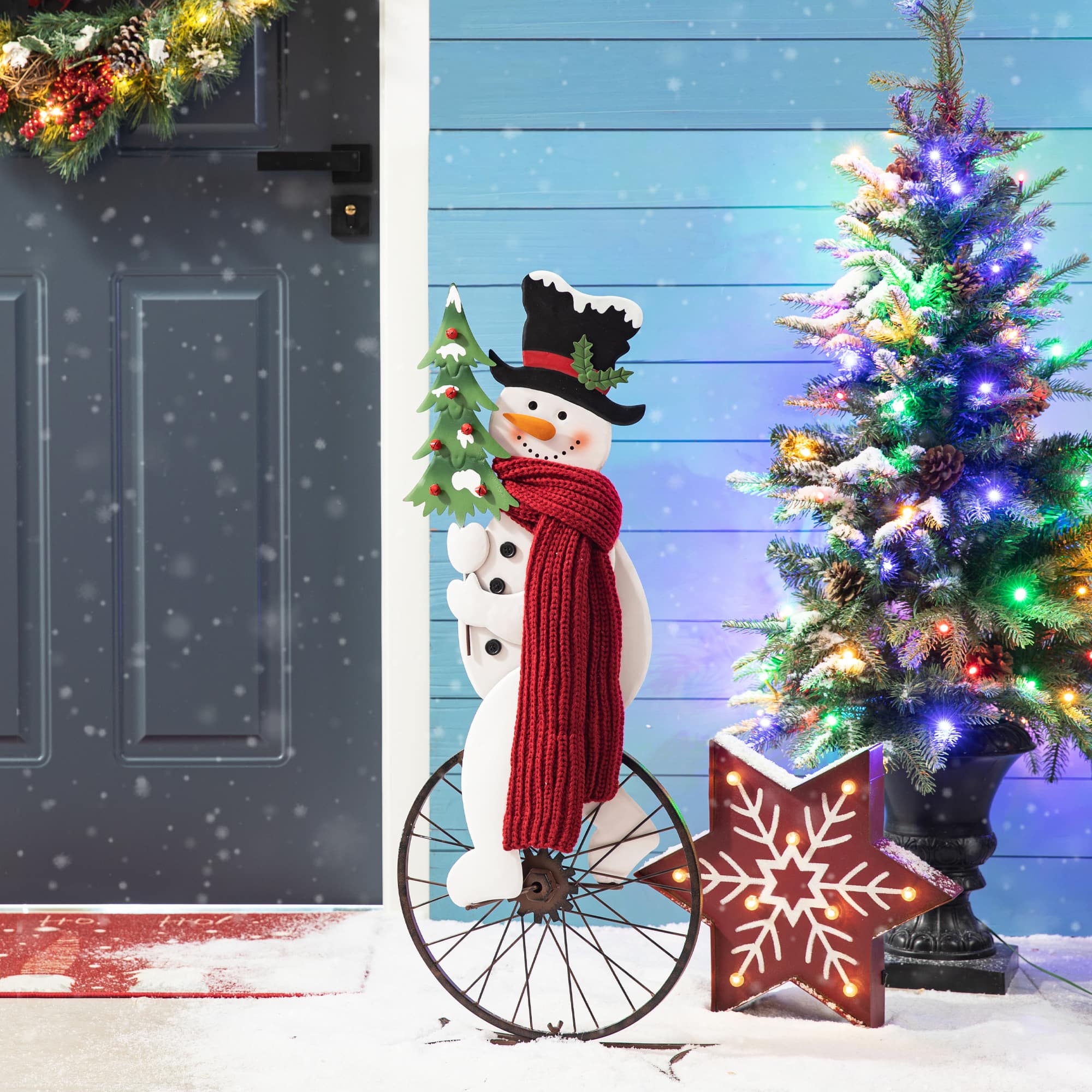 Glitzhome® 32" Metal Snowman Riding Bike Porch Décor