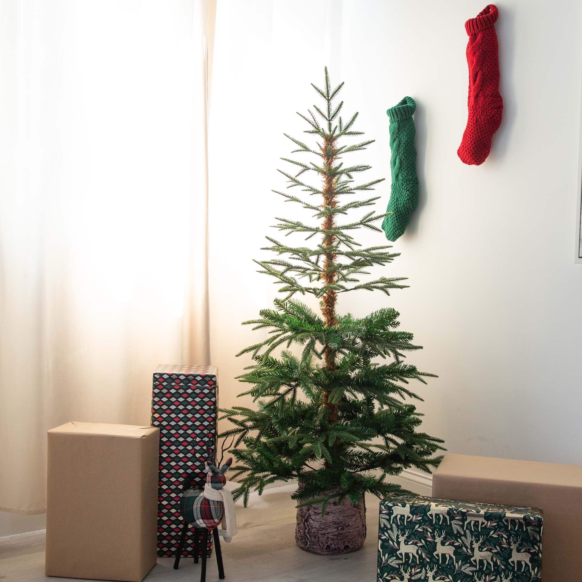 5ft. Unlit Woodland Fir Artificial Christmas Tree in Decorative Planter