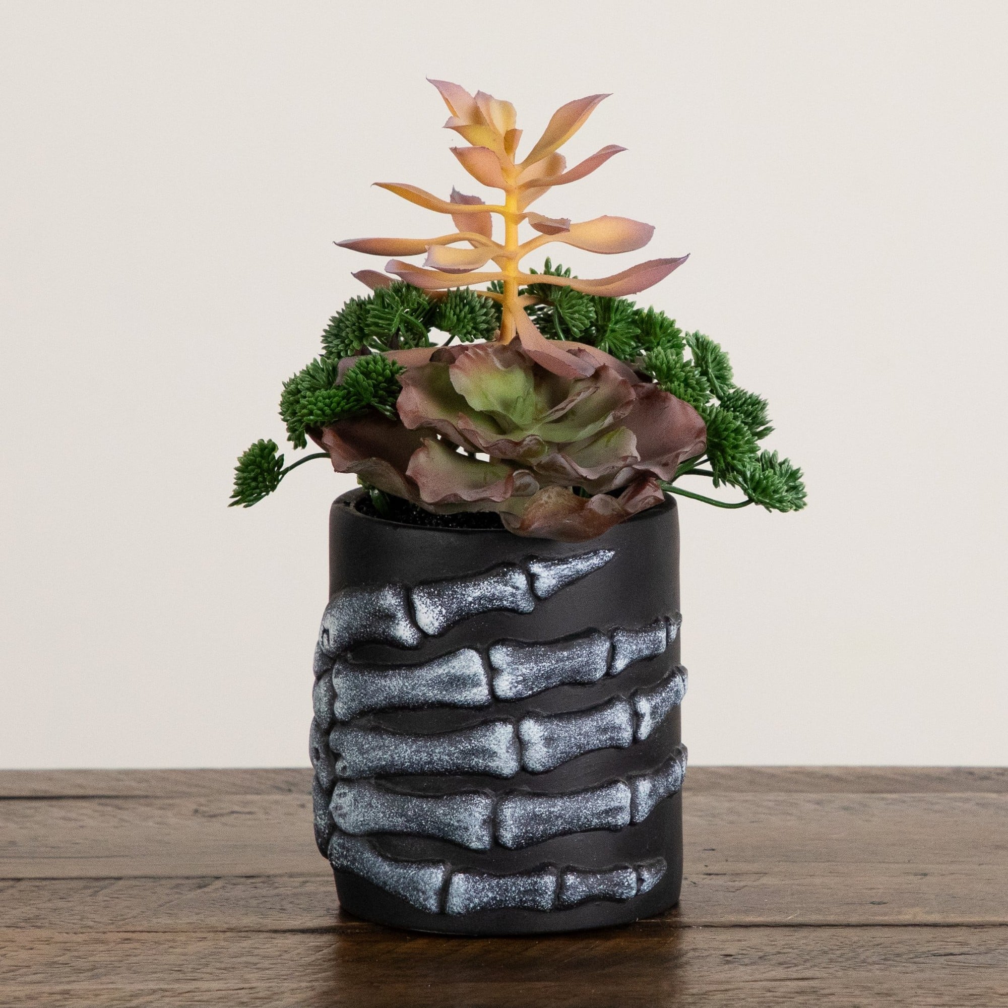9" Artificial Halloween Succulent Garden in Skeleton Hand Planter