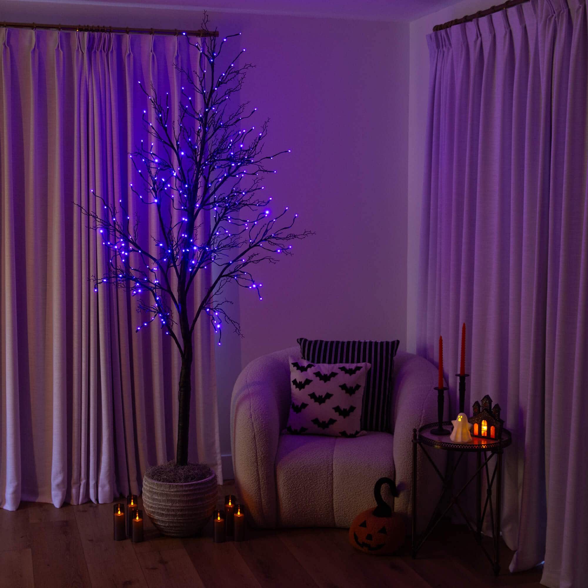 8ft. Pre-Lit Halloween Deluxe Black Twig Artificial Tree with 216 Orange & Purple LED Lights