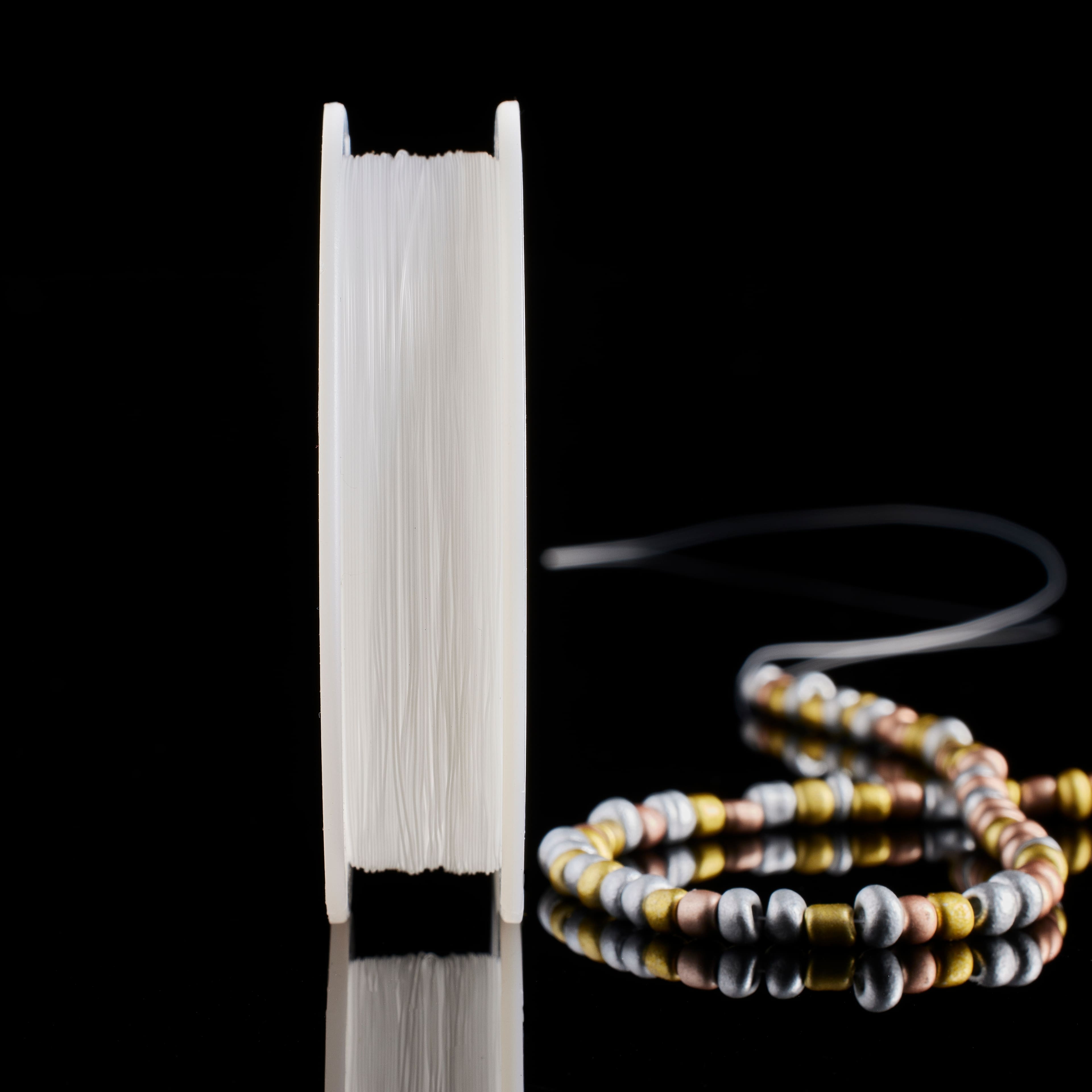 12 Pack: Beadalon® Supplemax™ 0.25mm Ultra Monofilament Illusion Cord