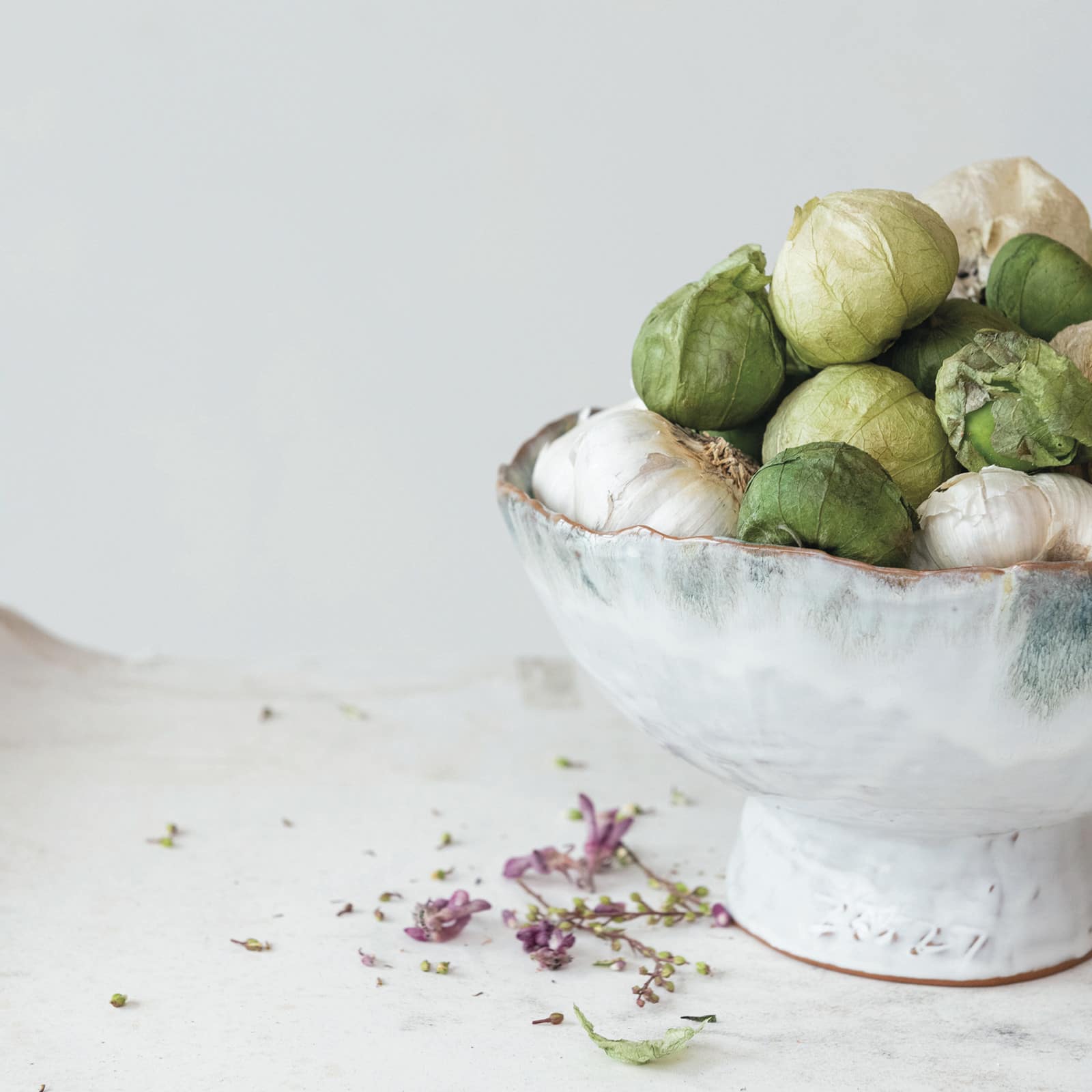 Hello Honey® 9" Green & Brown Stoneware Footed Bowl with Speckled Glaze