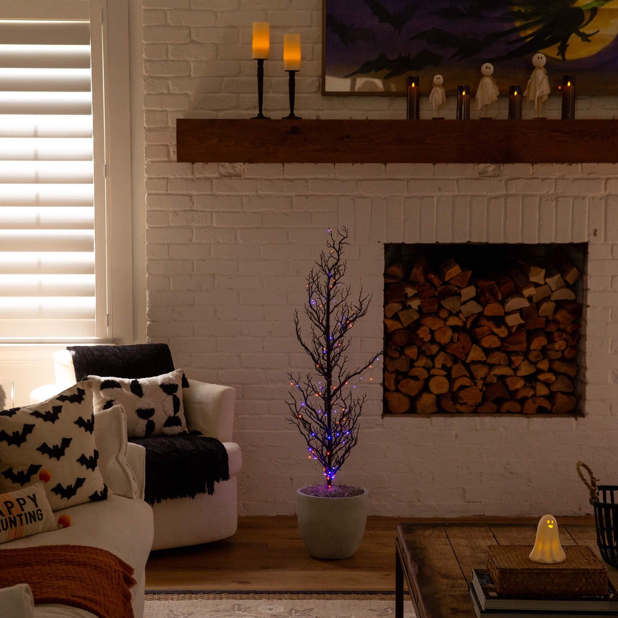4ft. Pre-Lit Artificial Halloween Black Spooky Twig Tree with 160 Orange & Purple Copper Wire String LED Lights