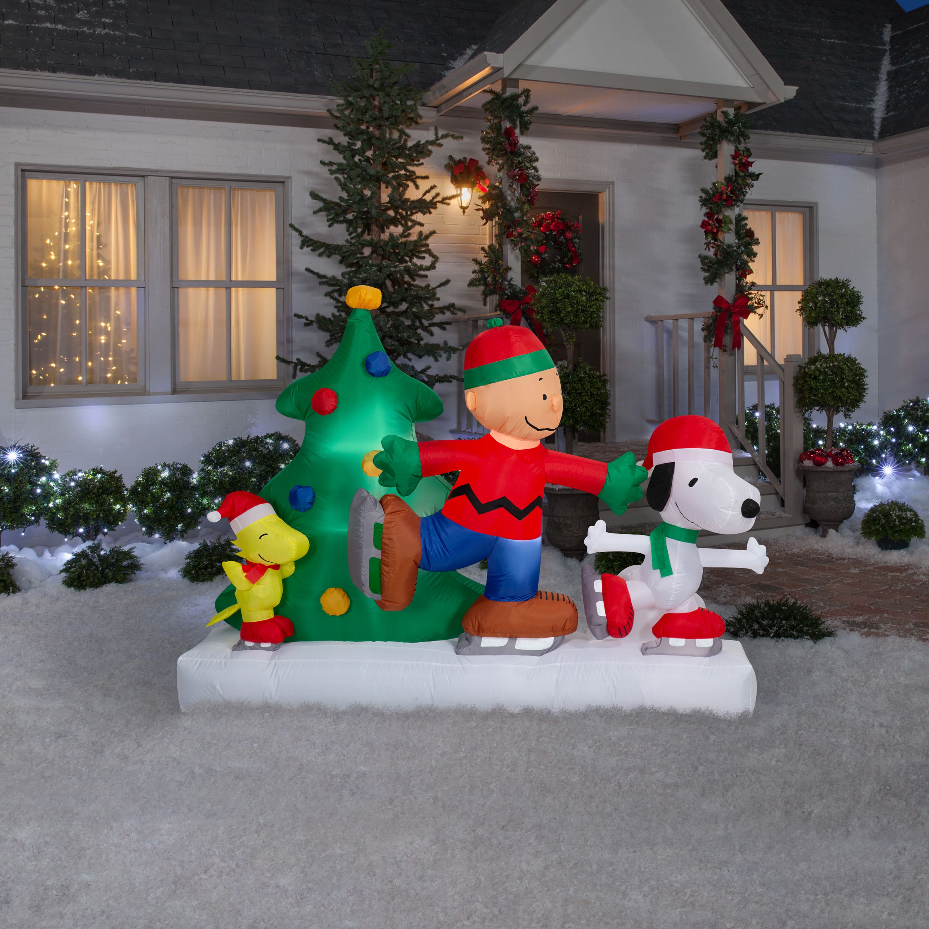 5ft. Airblown® Inflatable Peanuts® Skating Scene Christmas Light Décor