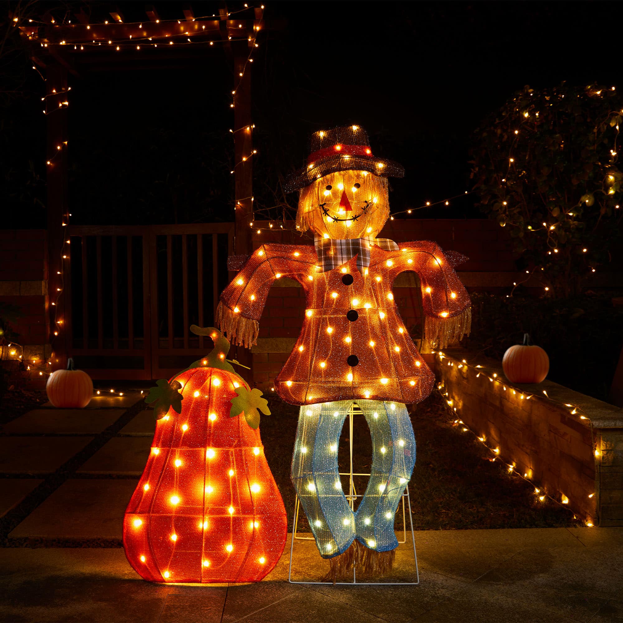 Glitzhome® Lighted Fall Scarecrow & Pumpkin Outdoor Decor with Warm White LED Lights Set