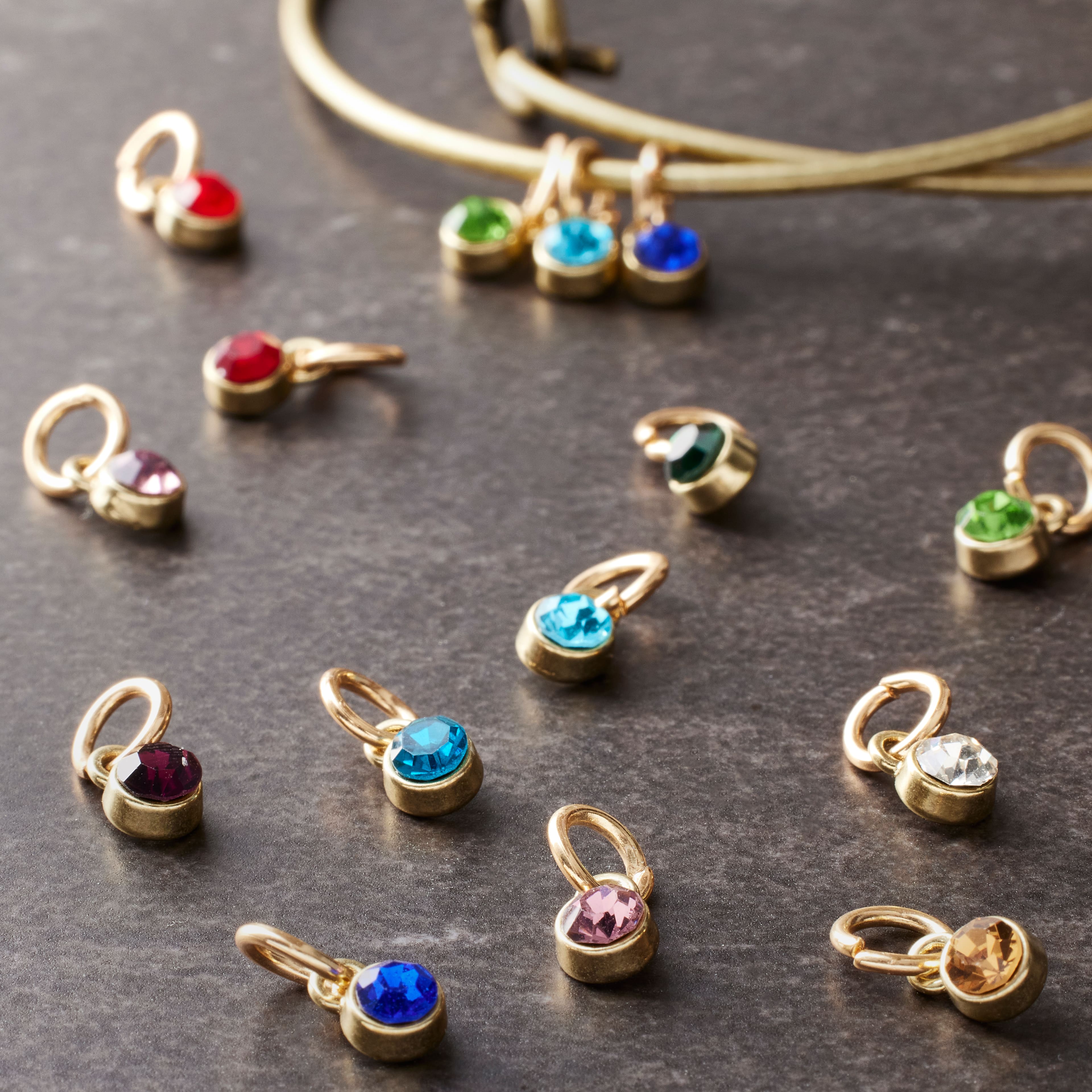 12 Packs: 24 ct. (288 total) Mini Gold-Colored Crystal Charms by Bead Landing™