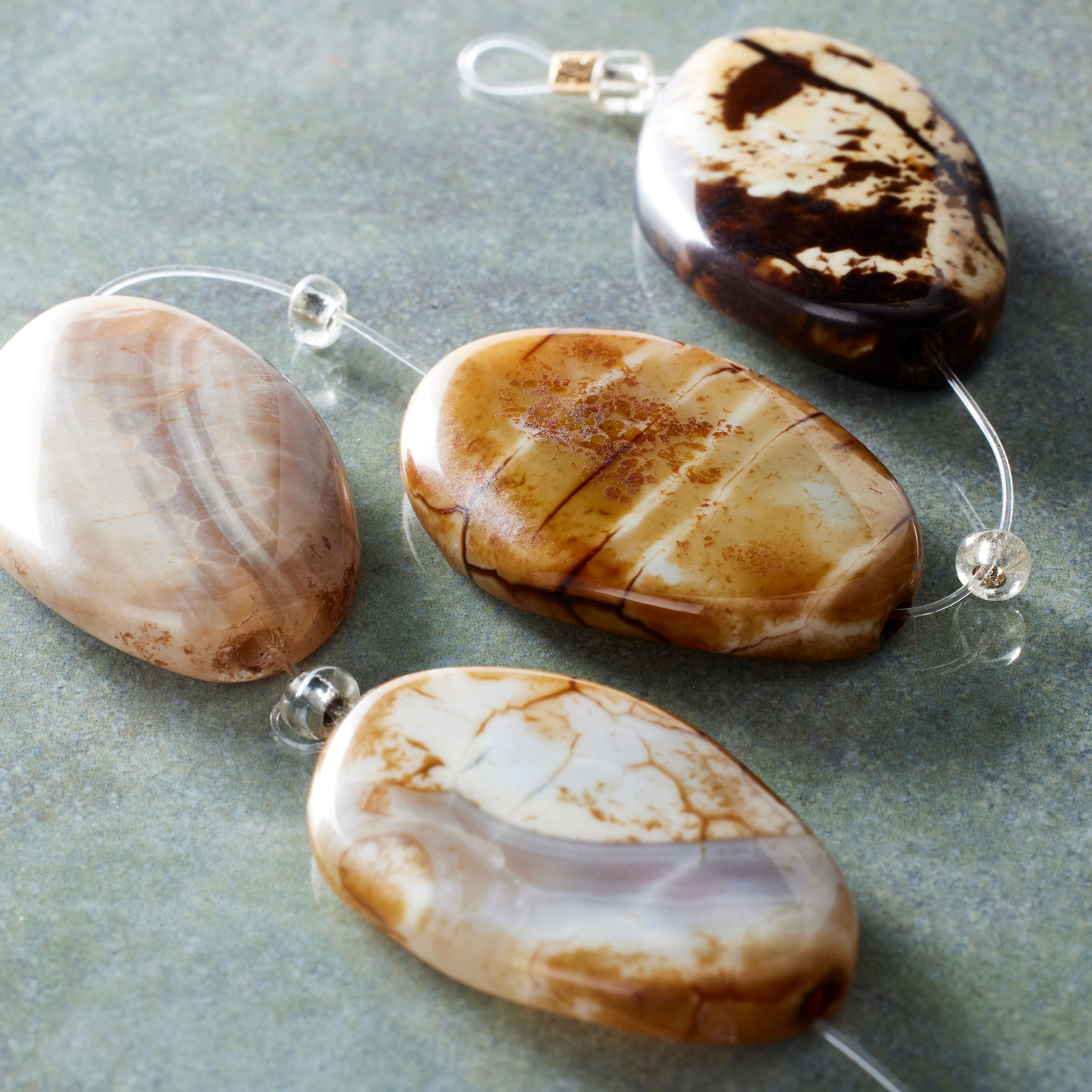 12 Pack: Amber Crackled Agate Oval Beads, 30mm by Bead Landing™