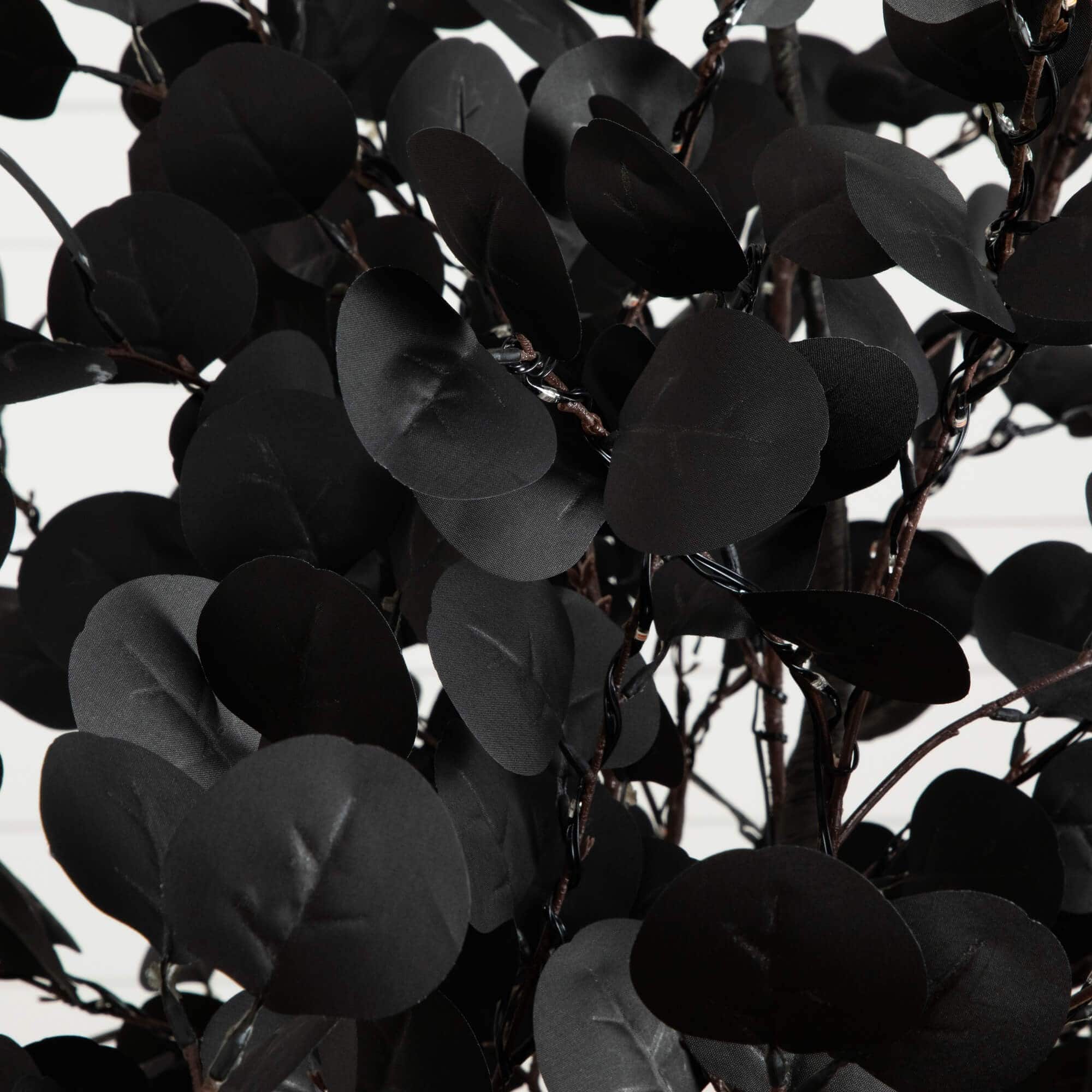 9ft. Pre-Lit Artificial Halloween Black Eucalyptus Tree with 700 Orange & Purple LED Lights
