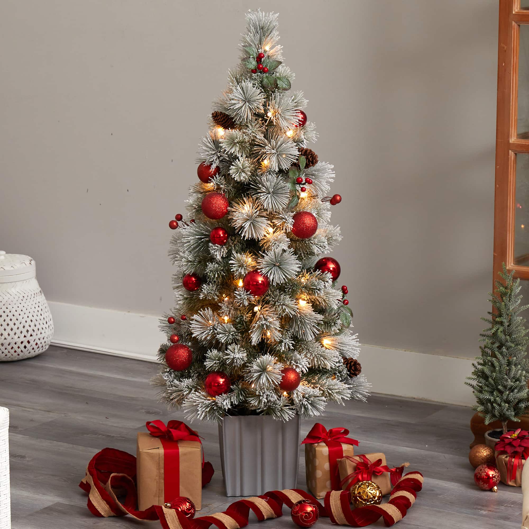 4ft. Pre-Lit Winter Flocked Artificial Christmas Tree in Decorative Planter, White LED Lights
