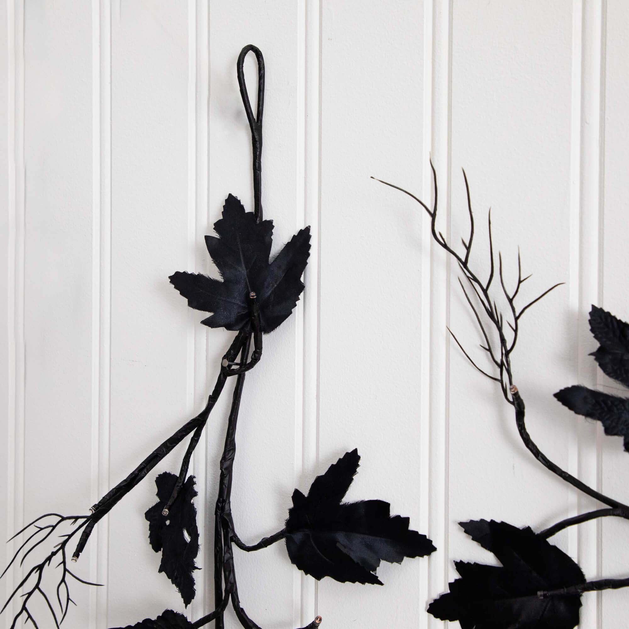 6.5ft. Pre-Lit Artificial Halloween Black Maple Garland with 48 Orange & Purple LED Lights